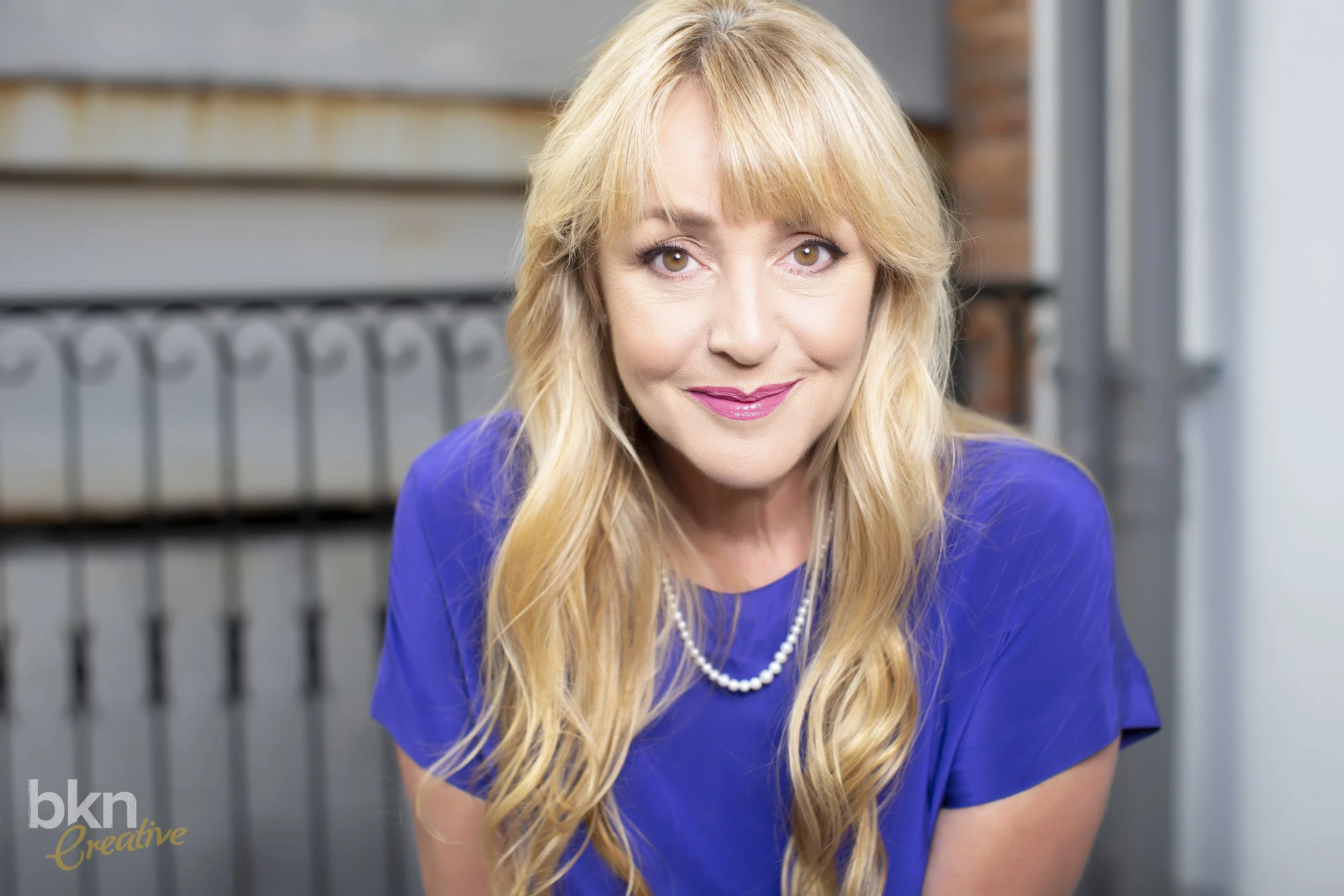 CarolineJett_Headshot_Image5_Logo.jpg