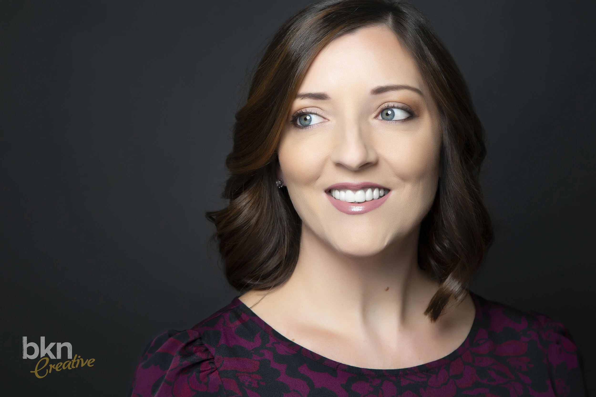 EmilyWarehame_Headshot_Image2_Logo.jpg