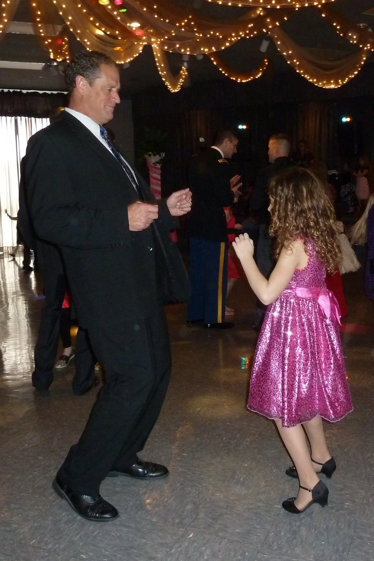 Good ole daddy-daughter dancing (this is not me, nor my father). (Photo via 417Magazine.com)