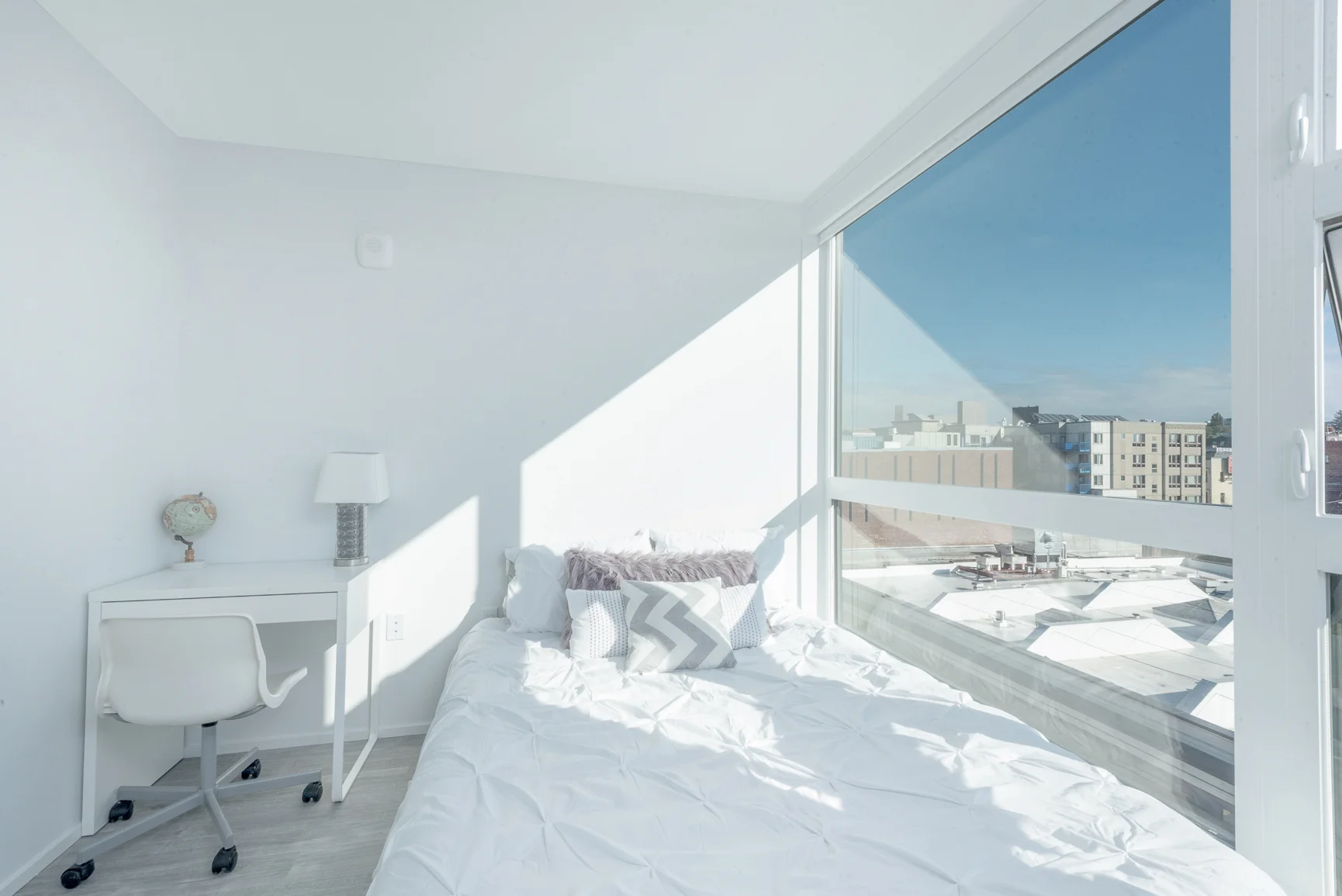 Bedroom at Pike Flats with white furniture