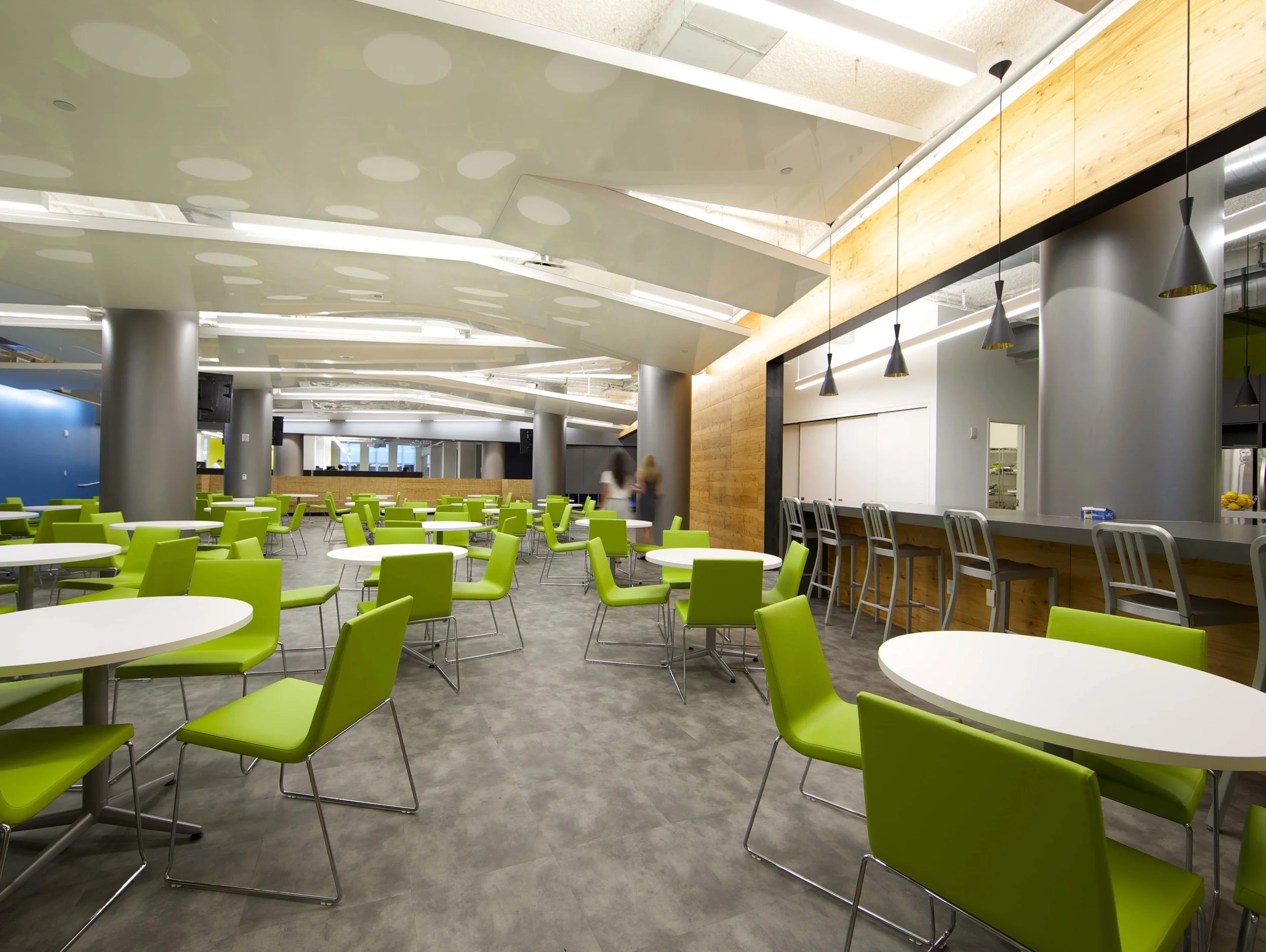 Green chairs in the breakroom area of the Rocketfuel headquarters. MEP by 2L Engineering.