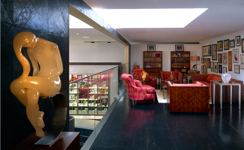 Figurine of a seated woman with flowing hair on display at an open seating lounge space in Institute Erno Laszlo Skincare. MEP by New York firm, 2L Engineering.