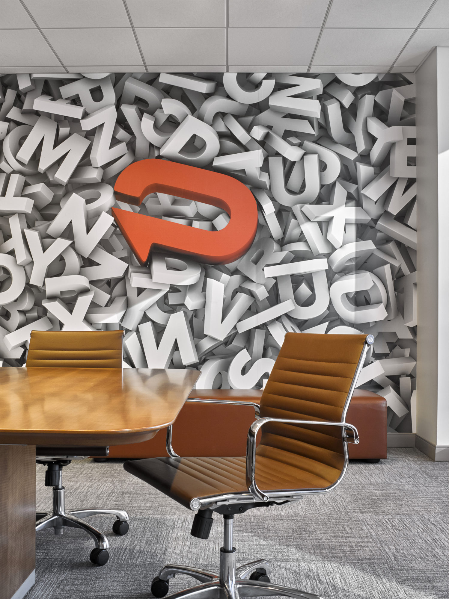 3D wallpaper with the Padilla CRT logo in a conference room at Padilla CRT, New York. MEP provided by 2L Engineering.