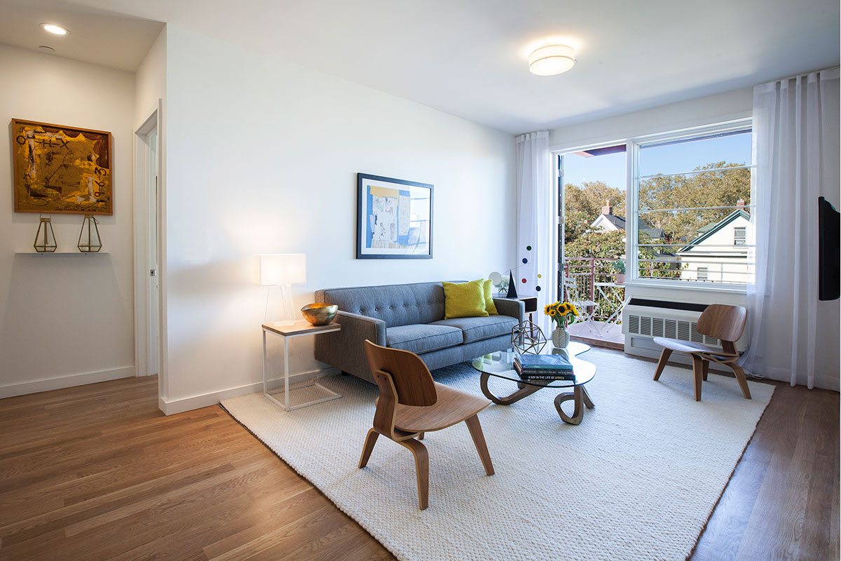 The interior design of the open layout apartment at The Lefferts House at 195 Hawthorne with MEP-FP engineering services provided by 2L Engineering