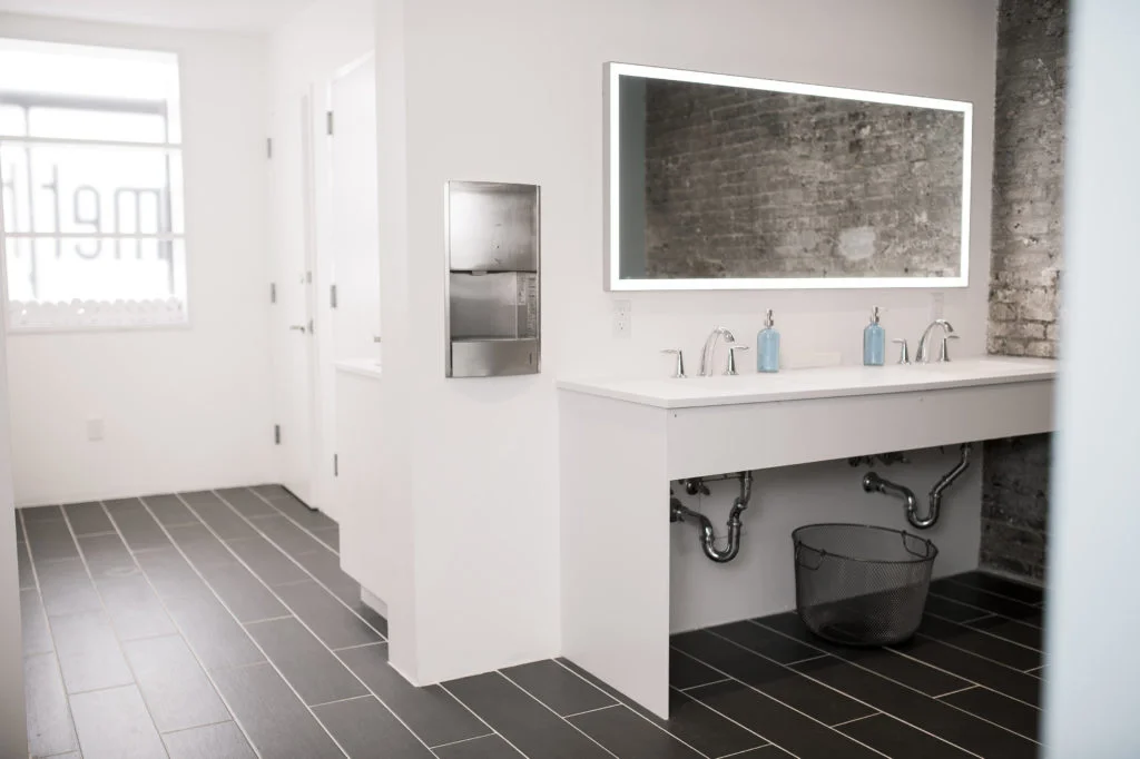The bathroom at the Bar Method at Williamsburg with MEP engineering provided by 2L Engineering