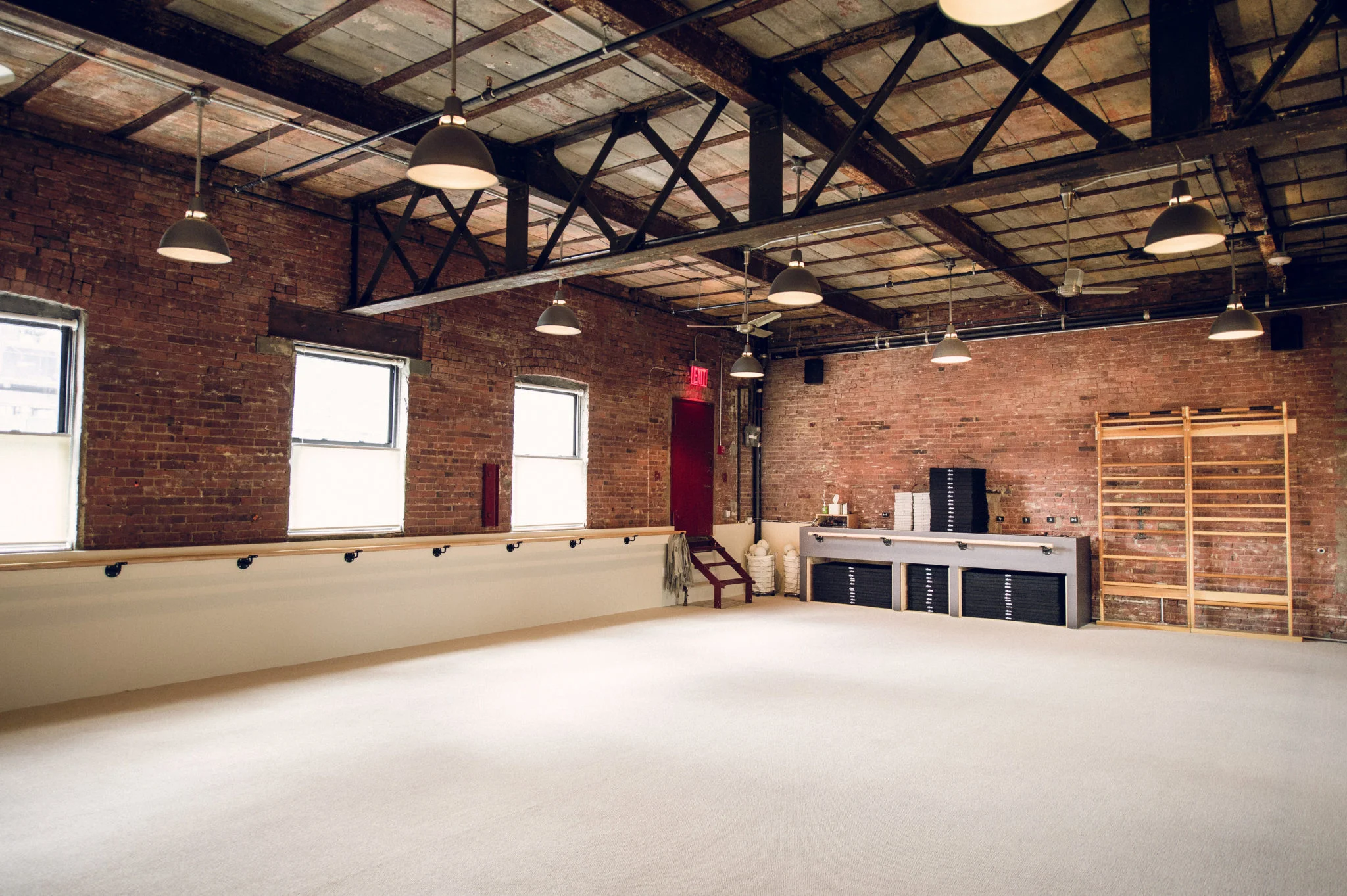 The interior of the Bar Method, fitness studio at Williamsburg with MEP engineering services provided by 2L Engineering.