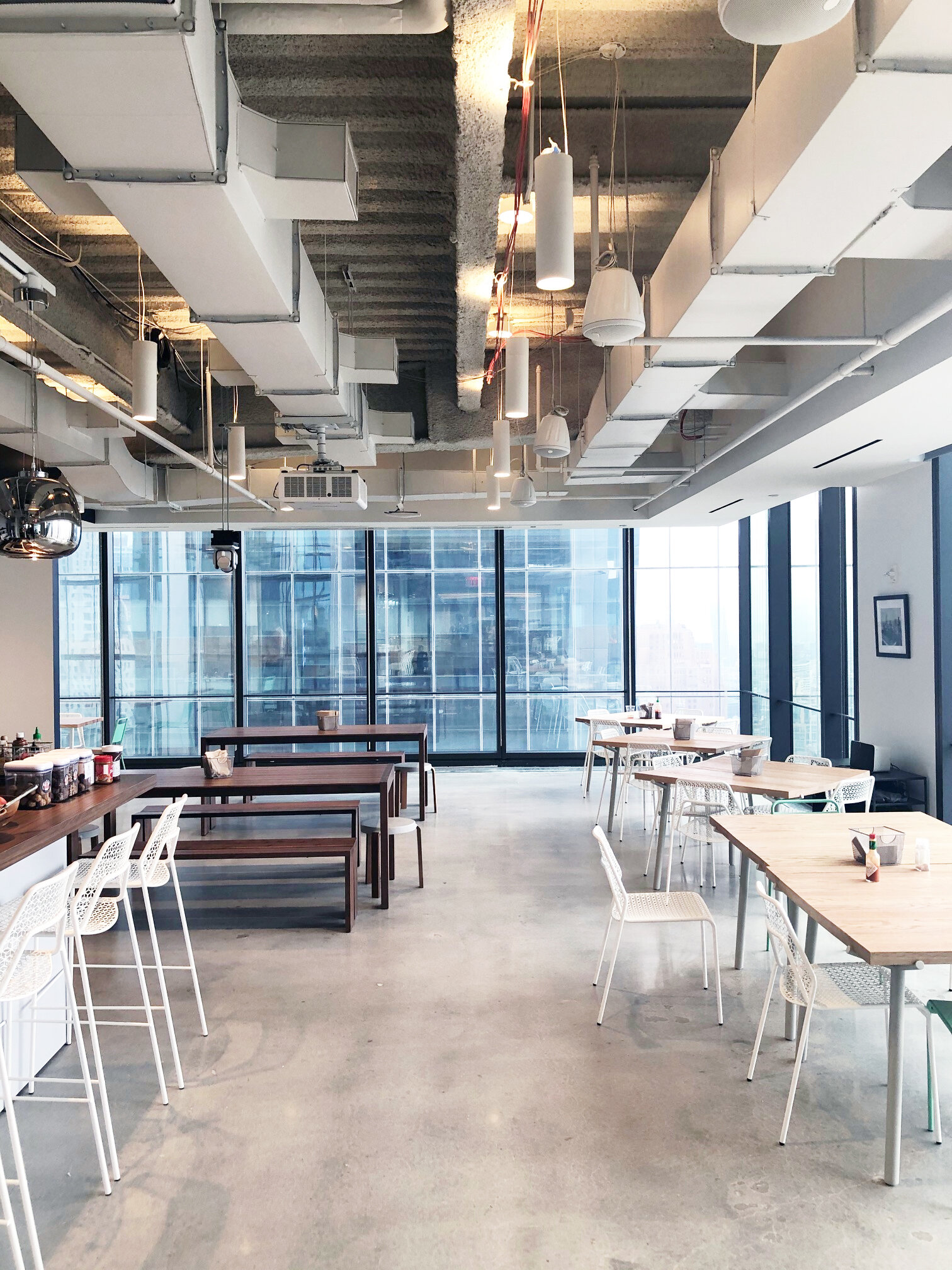 Interior seating area at the 3 WTC Asana office with MEP-FP engineering services provided by 2L Engineering.