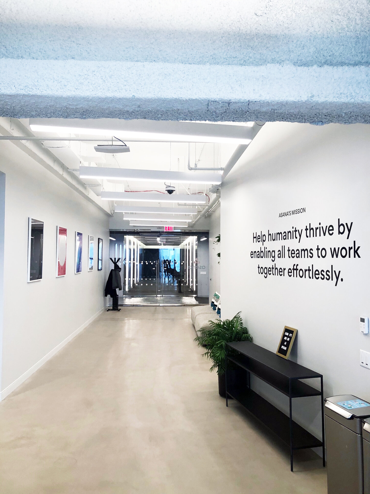 Asana hallway and mission statement at 3 WTC with MEP-FP engineering services provided by 2L Engineering. 