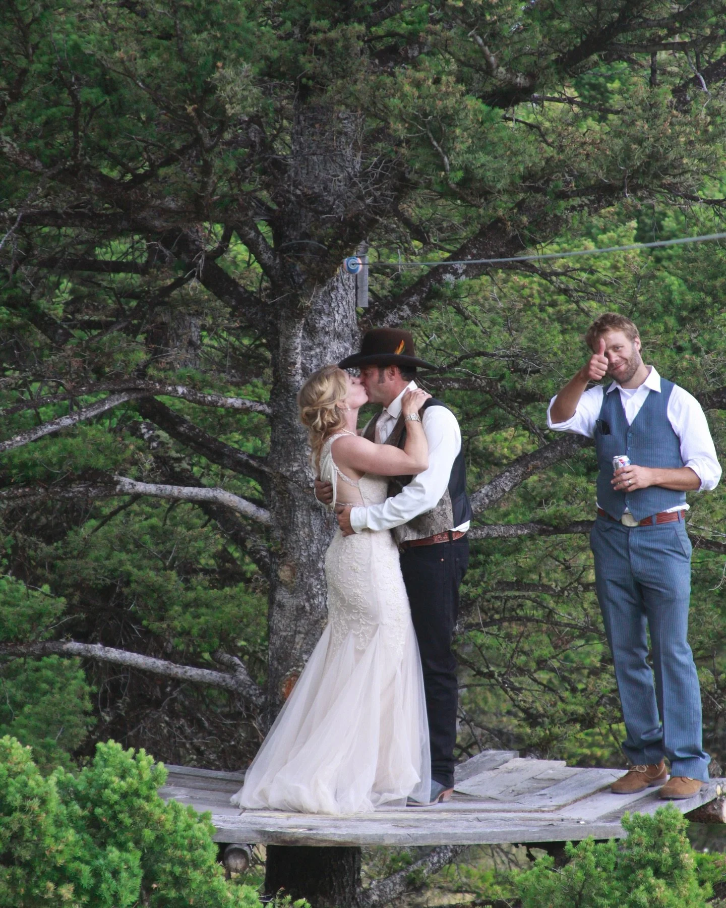 I zipped into his arms &mdash; heart wide open.

A kiss in the tree,
our vows echoing through the branches,
witnessed by the forest and loving friends.

Nine years later, we continue to grow:
deeper roots,
fuller blooms,
an ever-widening canopy
of lo