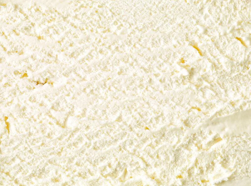 vanilla-ice-cream-texture-background-top-view-163503703.jpeg