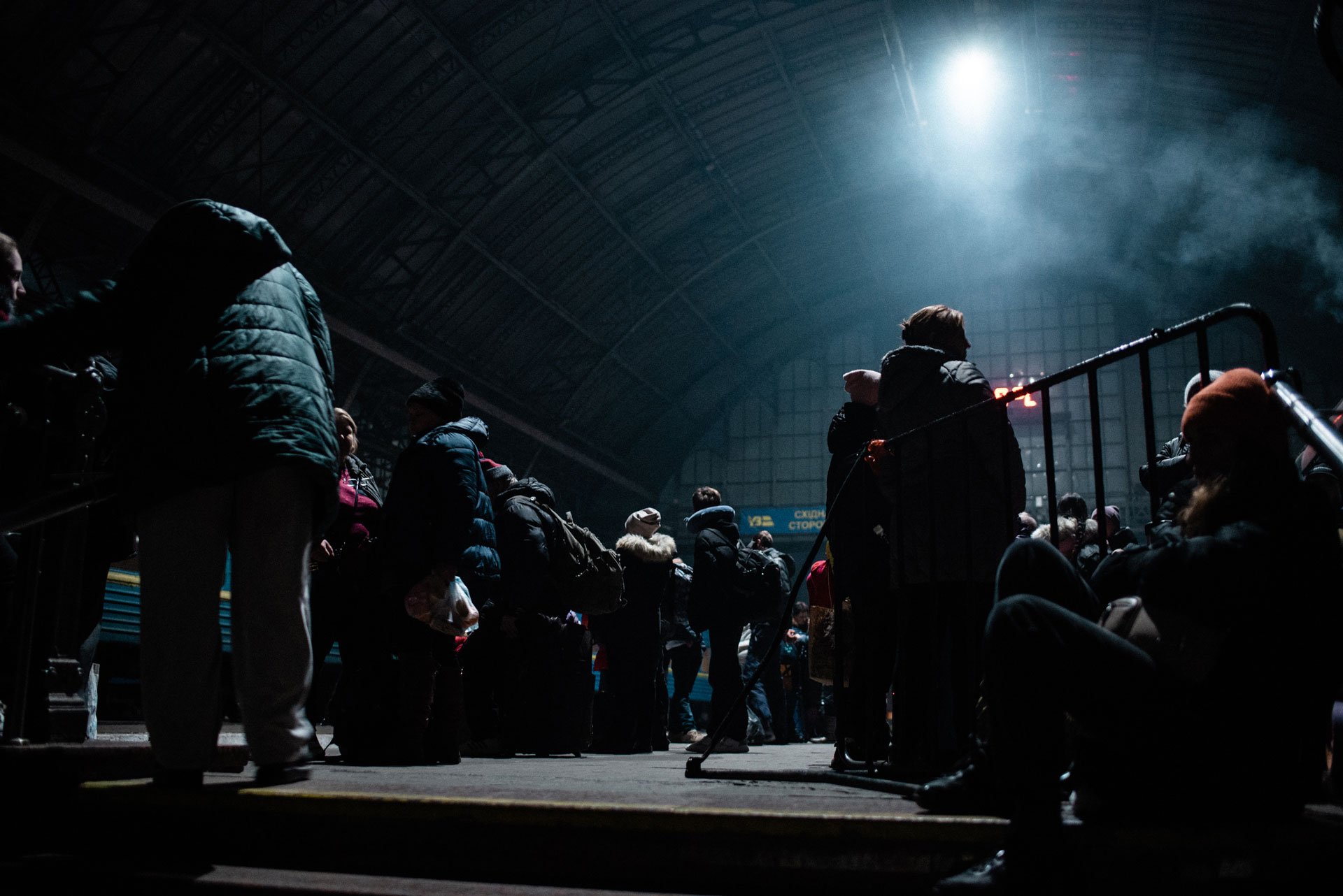 Ukrainian refugees in Lviv’s train station waiting to board the train that will take them out of the country and into Poland, the entrance to Europe.