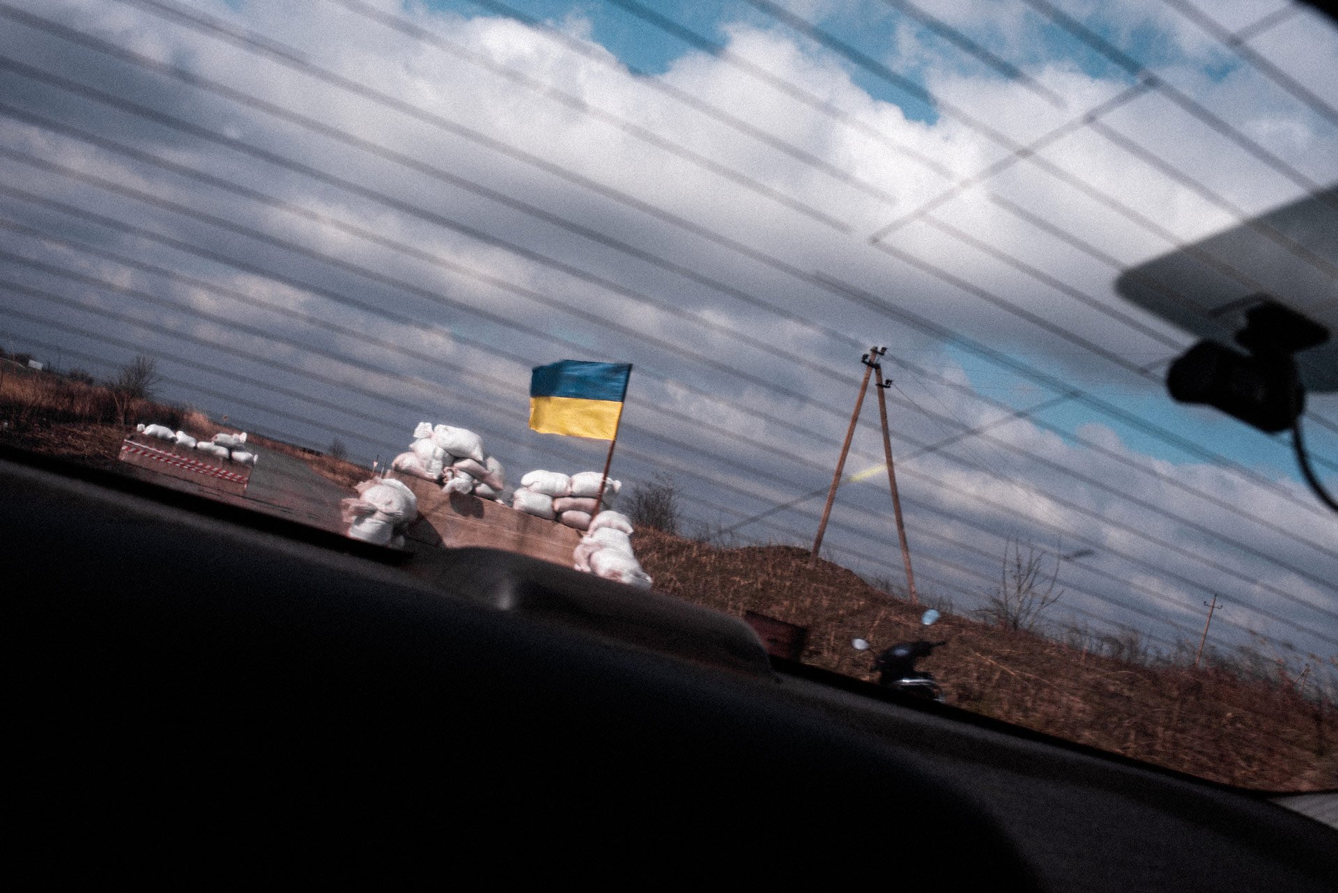 A roadside blockade with sandbags on the road to Izmail, Ukraine. These makeshift fortifications were prominent across every small road in the country, as residents of each region prepared for the approaching battle.