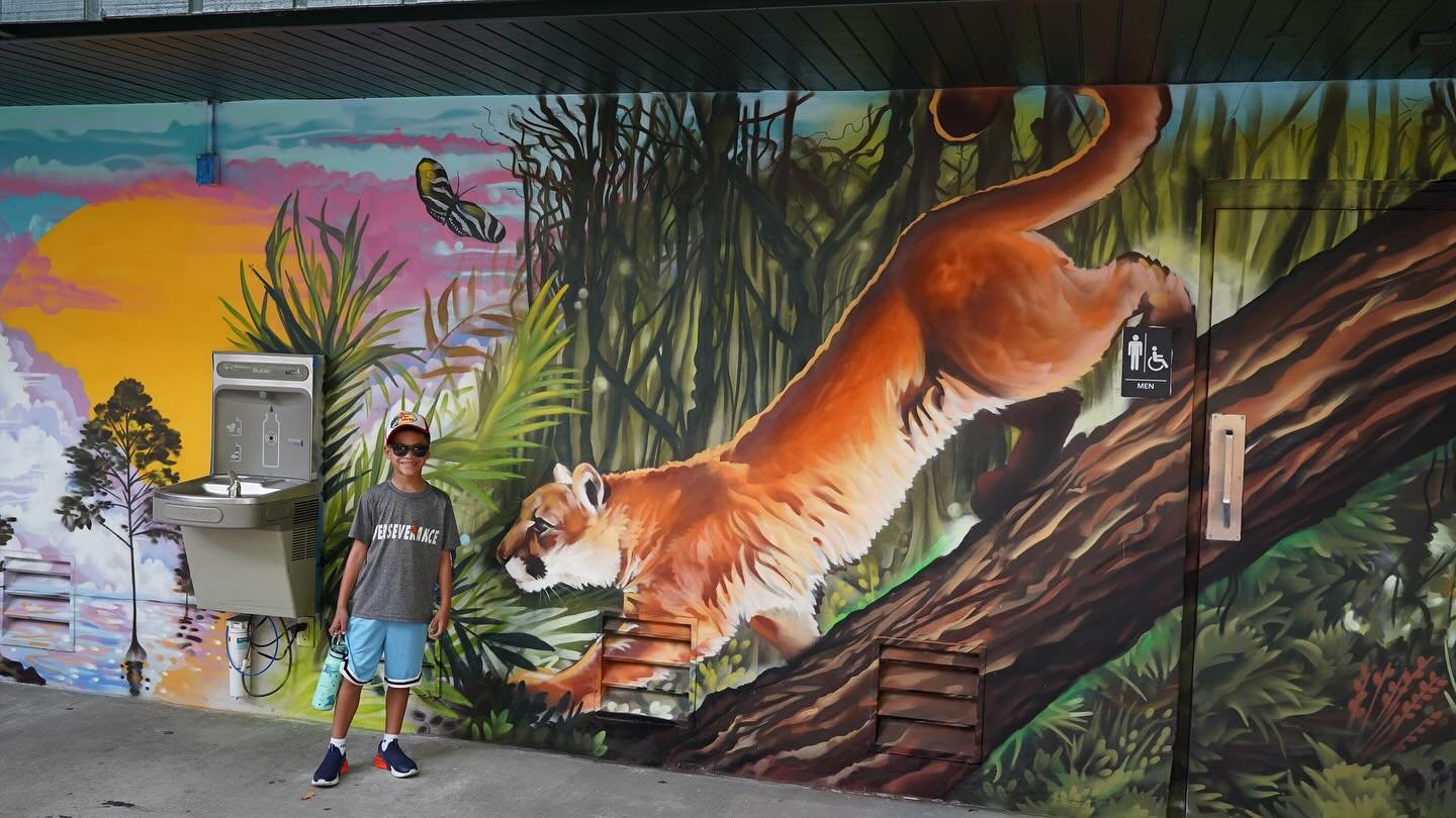 🎨✨ New Mural at @flamingogardens 🦅🐆

This past week, I had the honor of creating a vibrant, Everglades-inspired mural at Flamingo Gardens in celebration of their new Children&rsquo;s Garden and Outdoor Everglades Classroom! 🌿🌞
The mural features