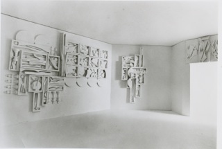 Maquette of the Twelve Apostles and Cross of the Resurrection. Elements on the Twelve Apostles maquette but not on the original include the chess pieces, replaced with curving wood elements. Elements missing on the maquette but present on the final sculpture are curving elements attached to the four lower circular elements. 
