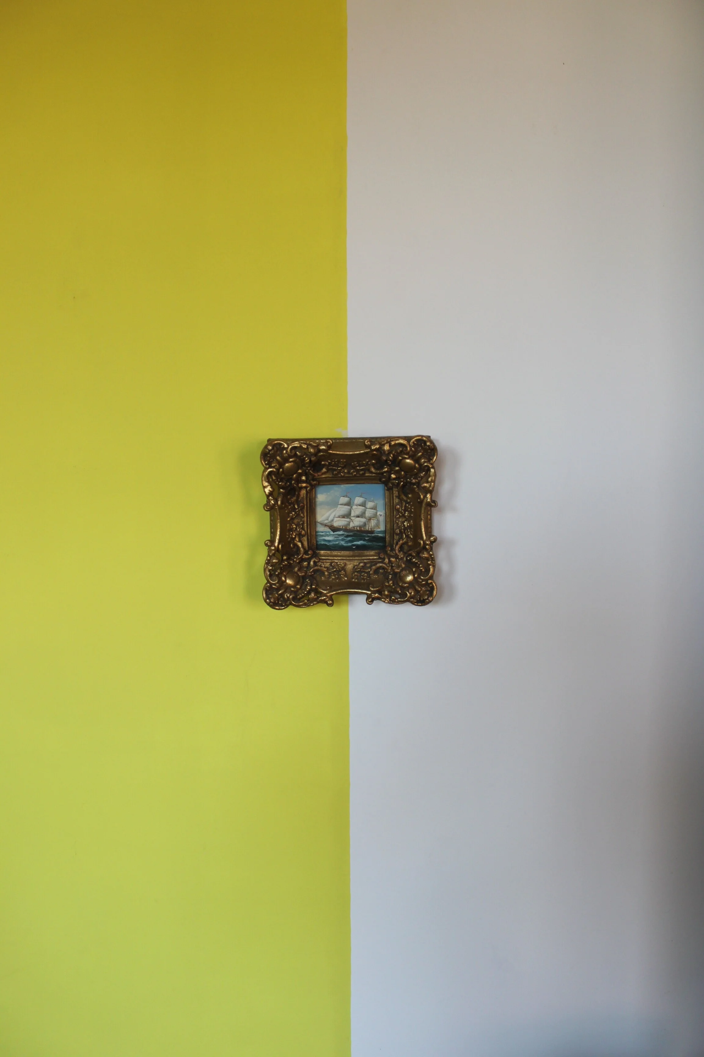 Small framed picture on yellow.JPG