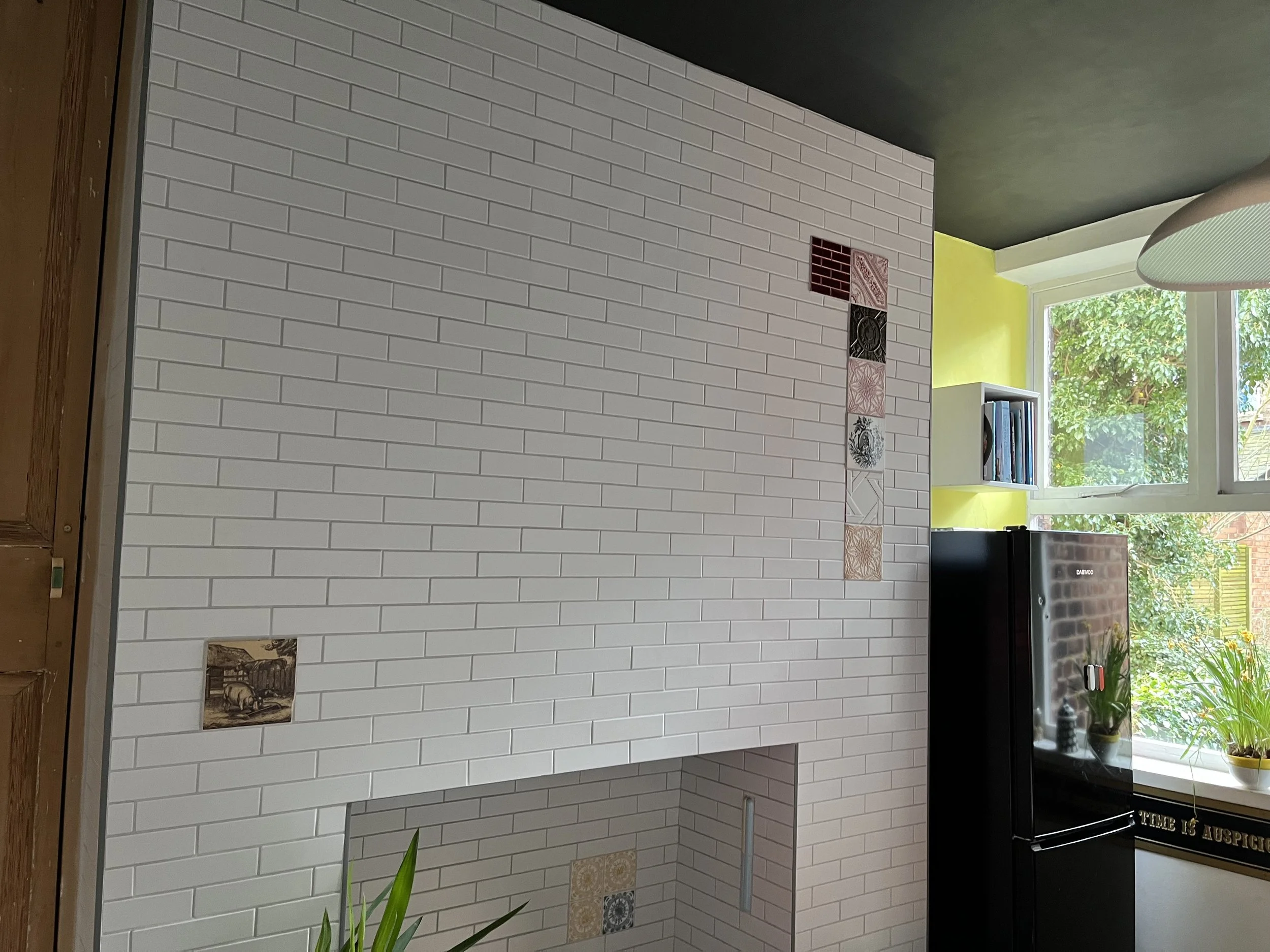 white tiled fireplace.jpeg