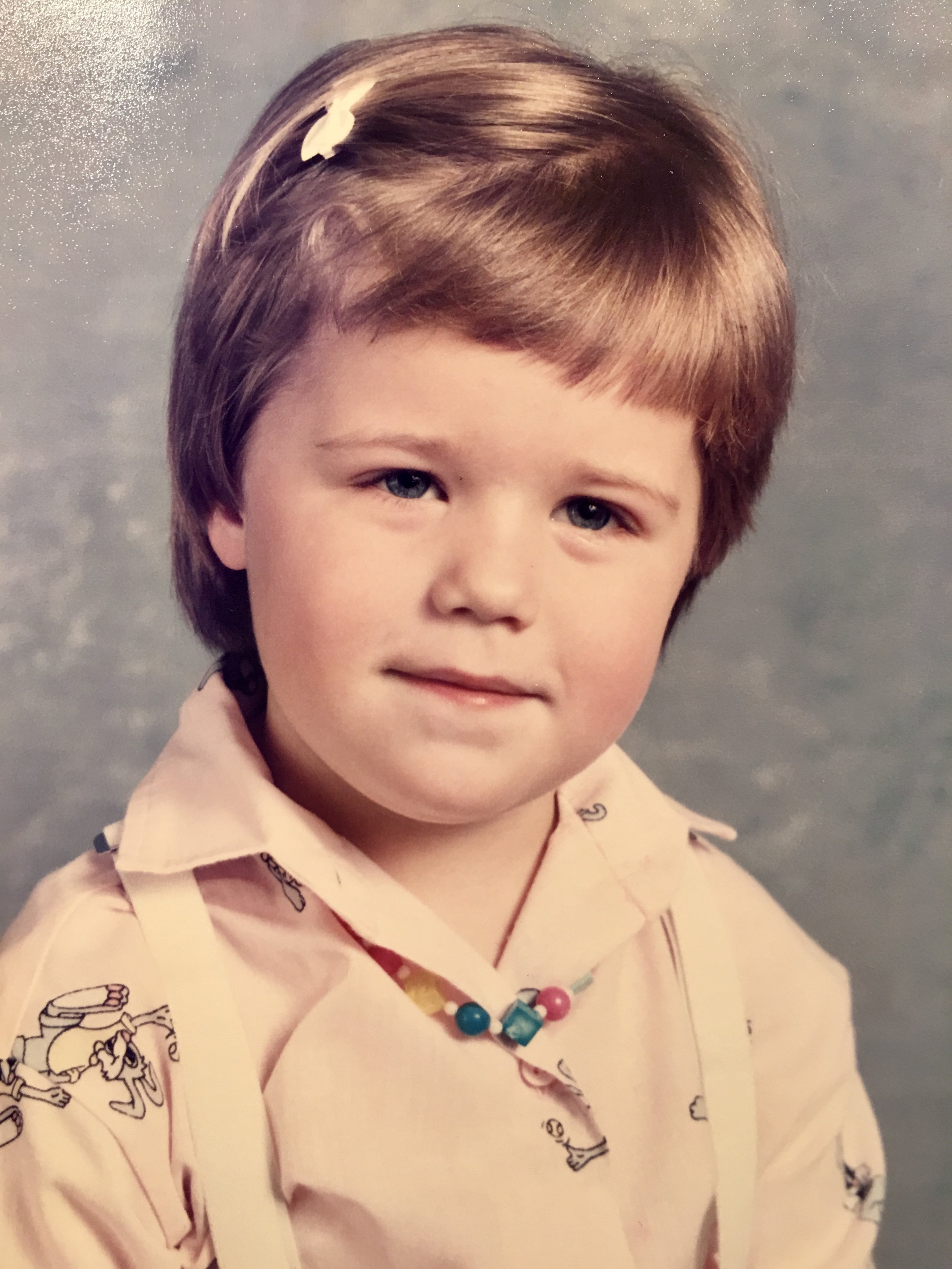  This is my favorite picture of little me. The small barrette, the necklace, the suspenders. Feels very put together. 