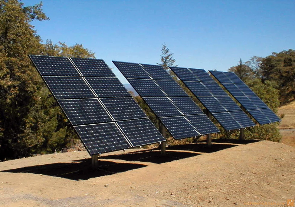 30b-direct-power-top-of-pole-mounts-supporting-7-kw-sanyo-solar-system.jpg