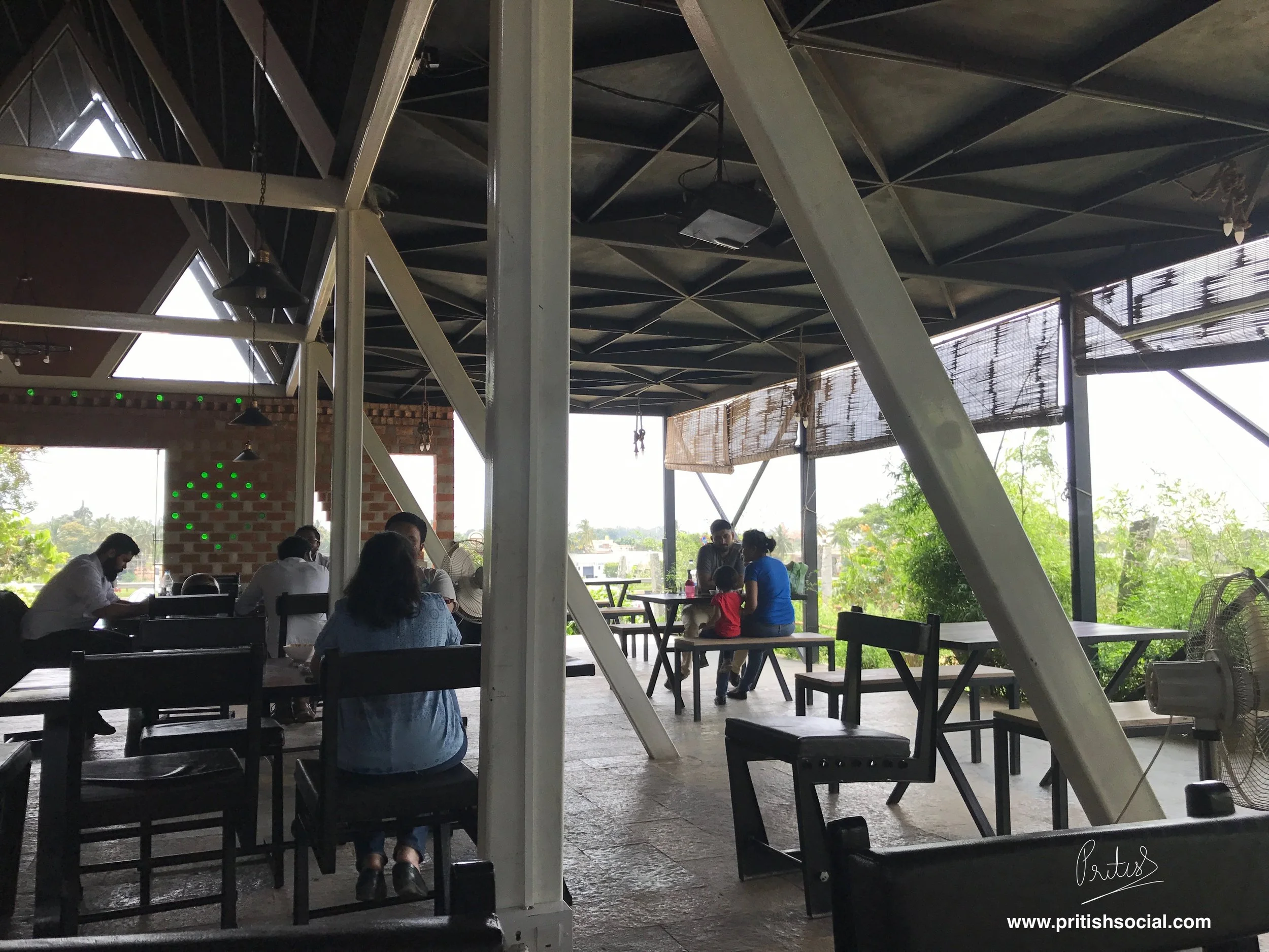 Families and couples eating and enjoying the food and ambience at NH7 Refuel Restaurant