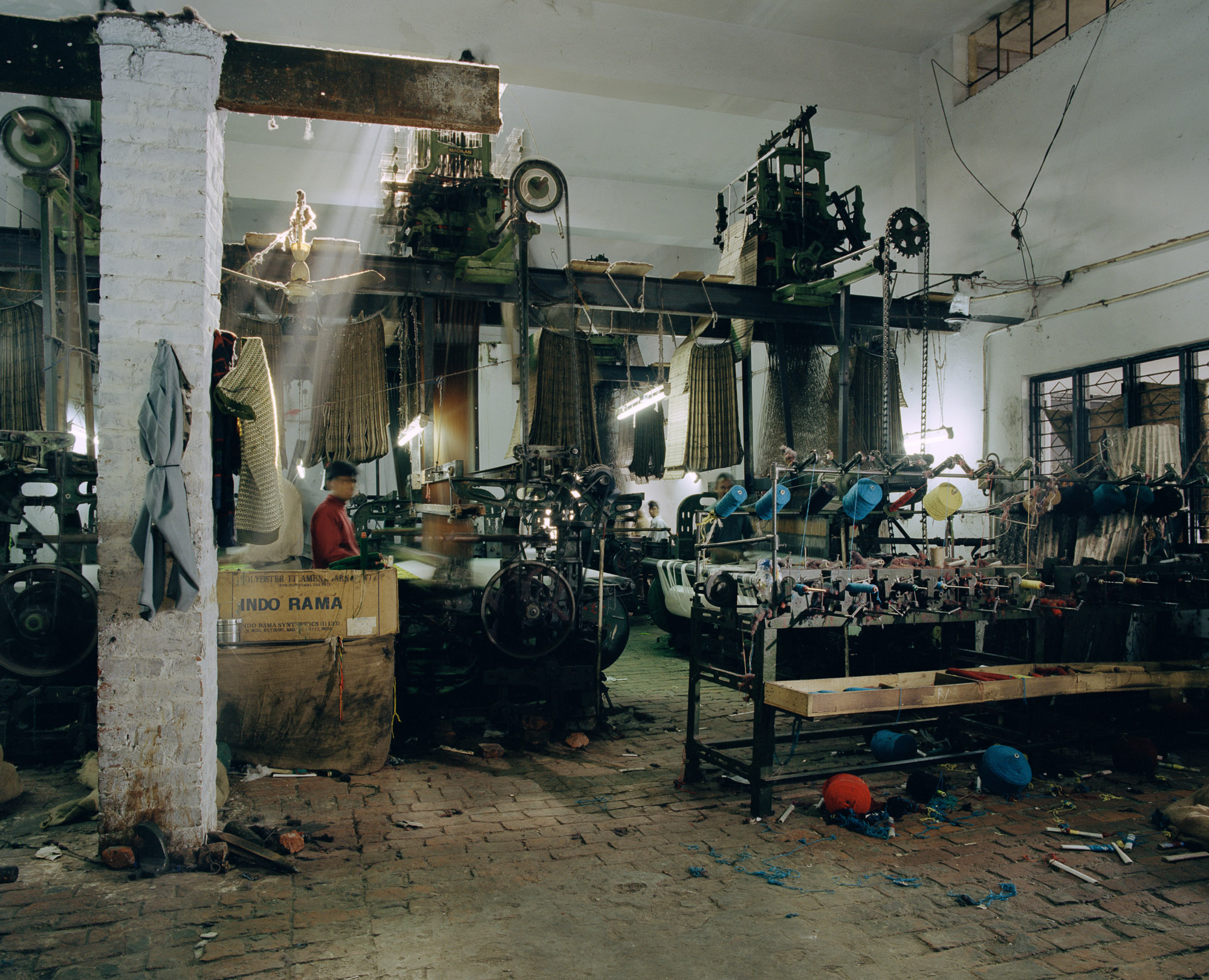 Other factories house heavy old power looms used for weaving shoddy blankets. Shoddy weaving expanded rapidly in the 1980s, using machinery imported from Italy and Poland.