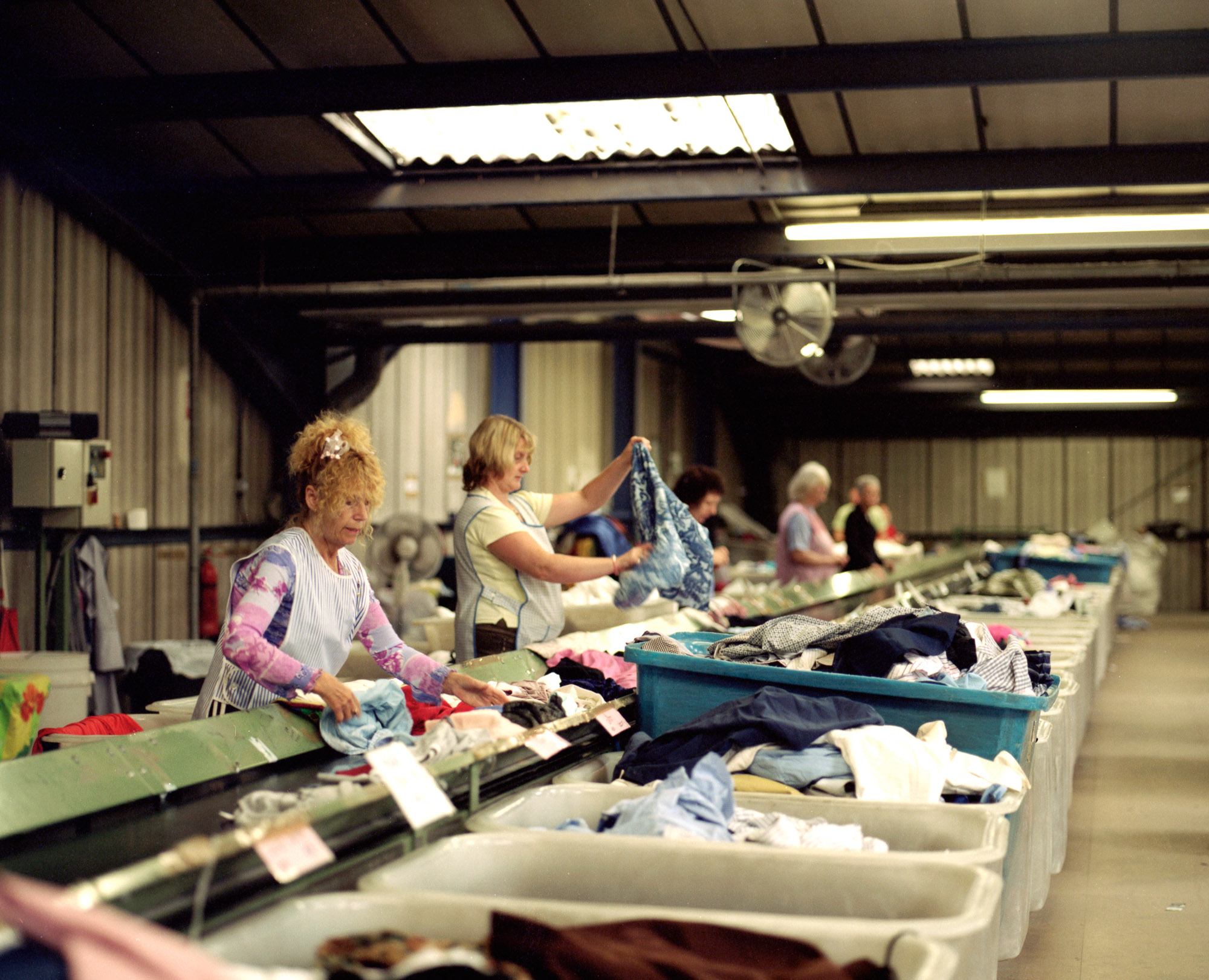  Over half a million tonnes of cast-offs are collected annually, of which only  about 20% is reused in the UK. Clothes are sorted and graded into categories  based on garment style, fabric, weight and colour depending on the current demands of the va