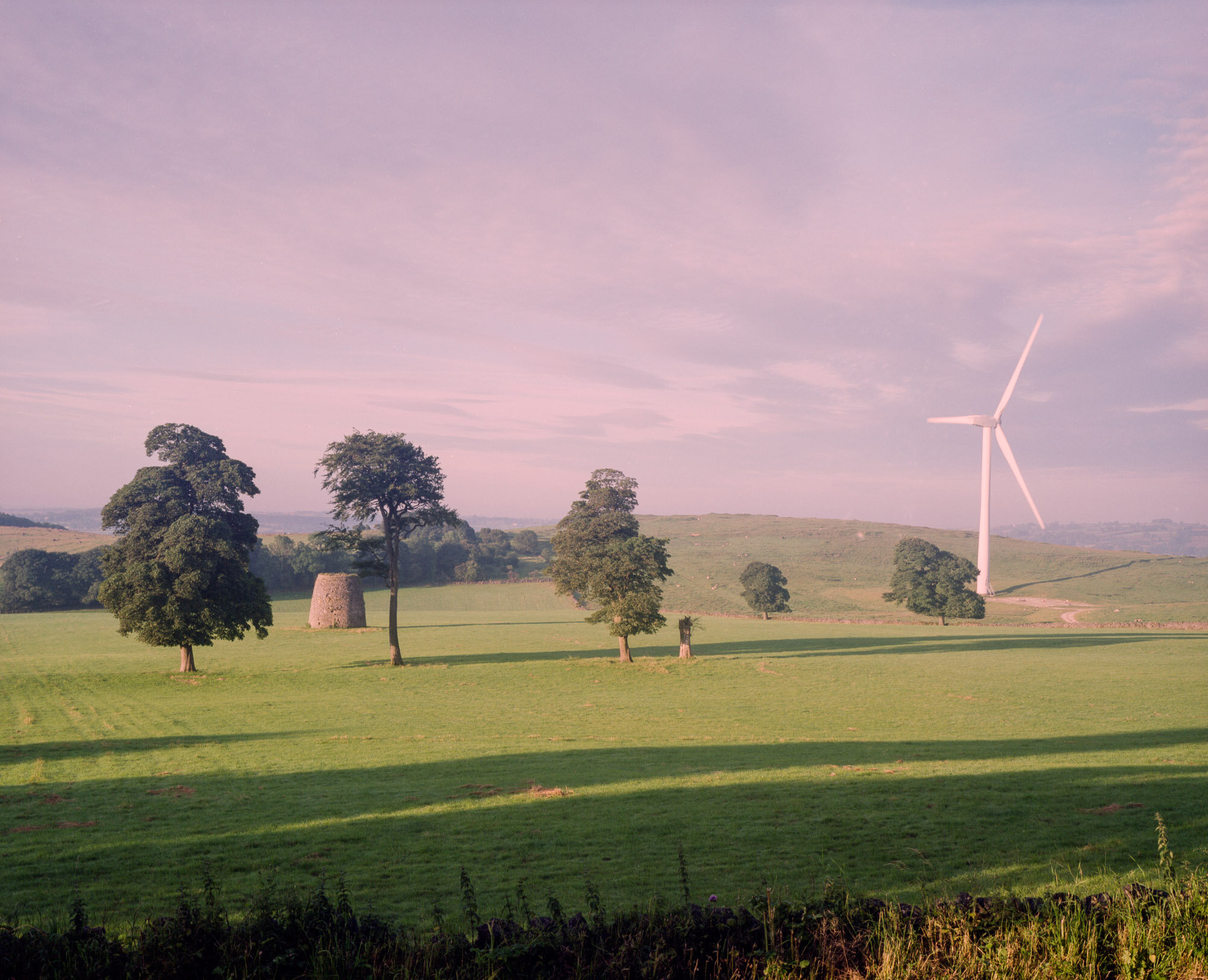  Ancient windmill remains and wind turbine, Middleton Top. 