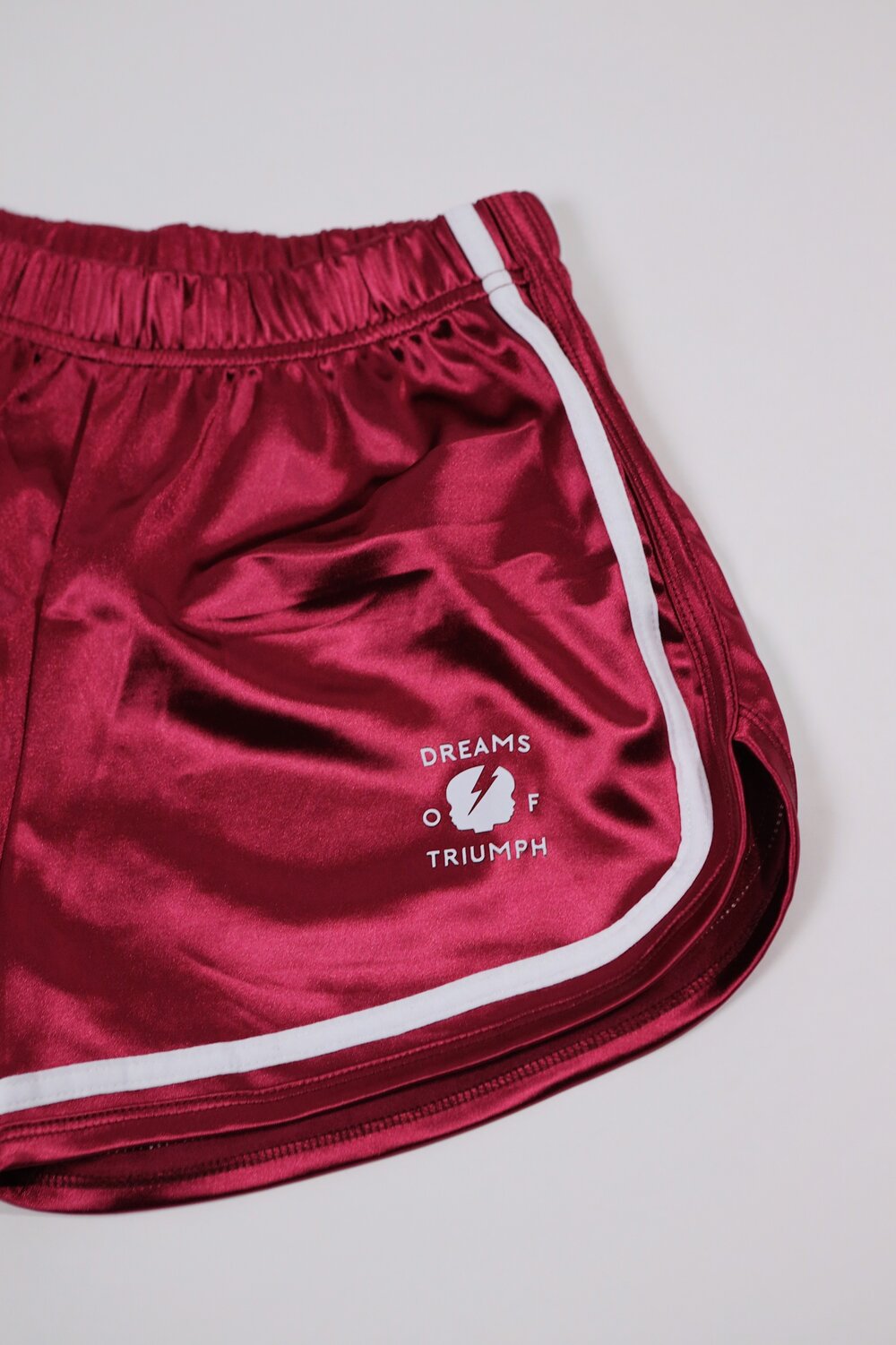 The logo Dream Shorts is — Womens Premium Real Satin