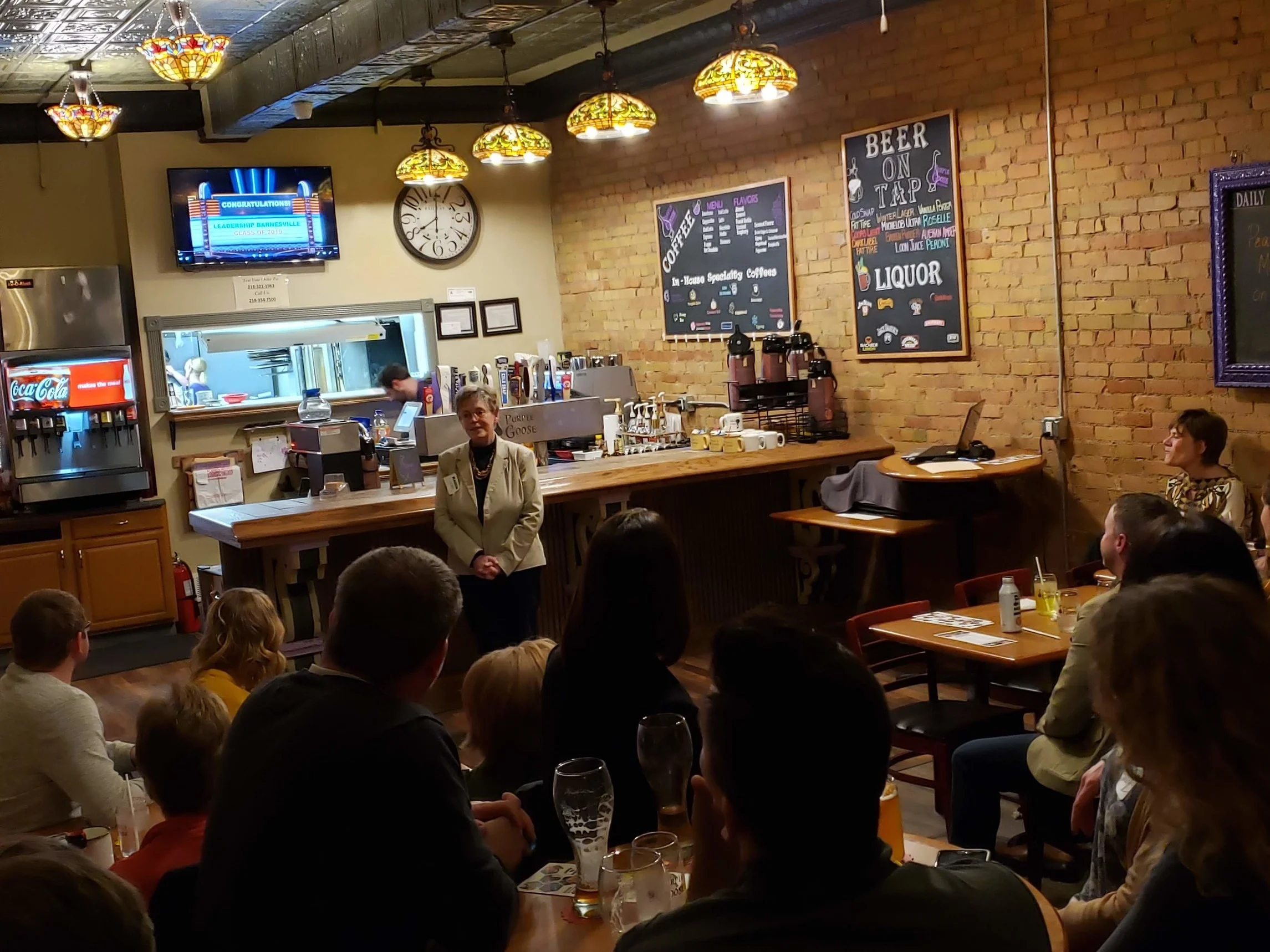 Karen Lauer speaks to the Leadership Barnesville graduating class at the Purple Goose restaurant.