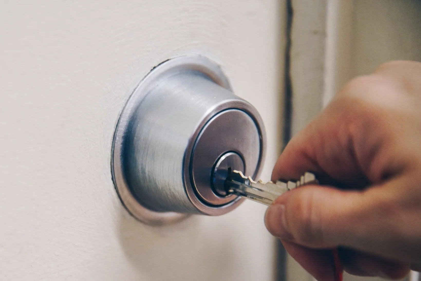 hand-using-key-in-door.jpg