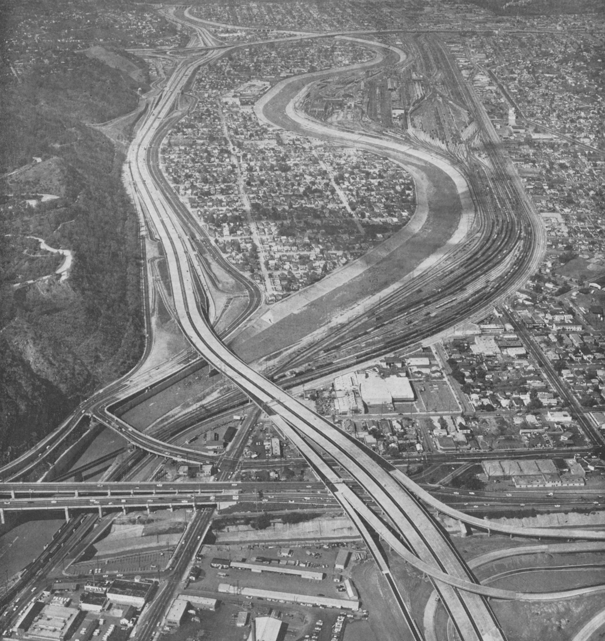  12. Aerial view looking up river just after Interstate 5 construction, 1962 