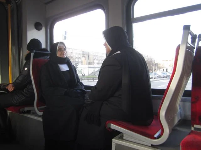 Warsaw nuns on tram.jpg