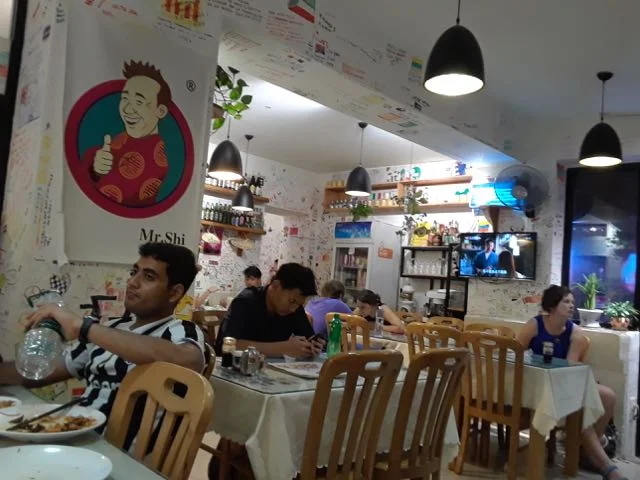 Visitors tend to leave their mark on Mr. Shi's Dumplings.