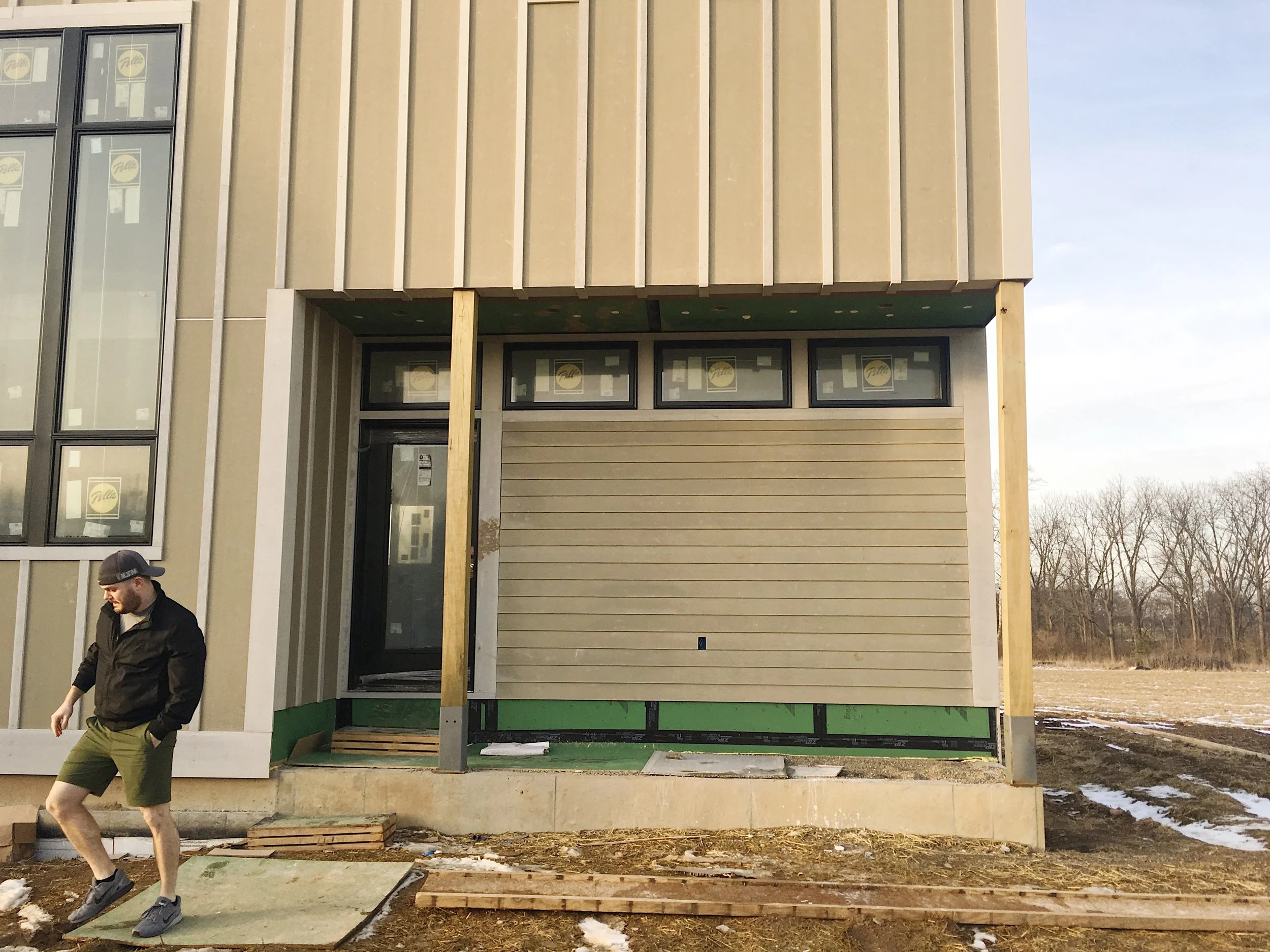 Week 22: Tile, Siding and Trim Work Continues