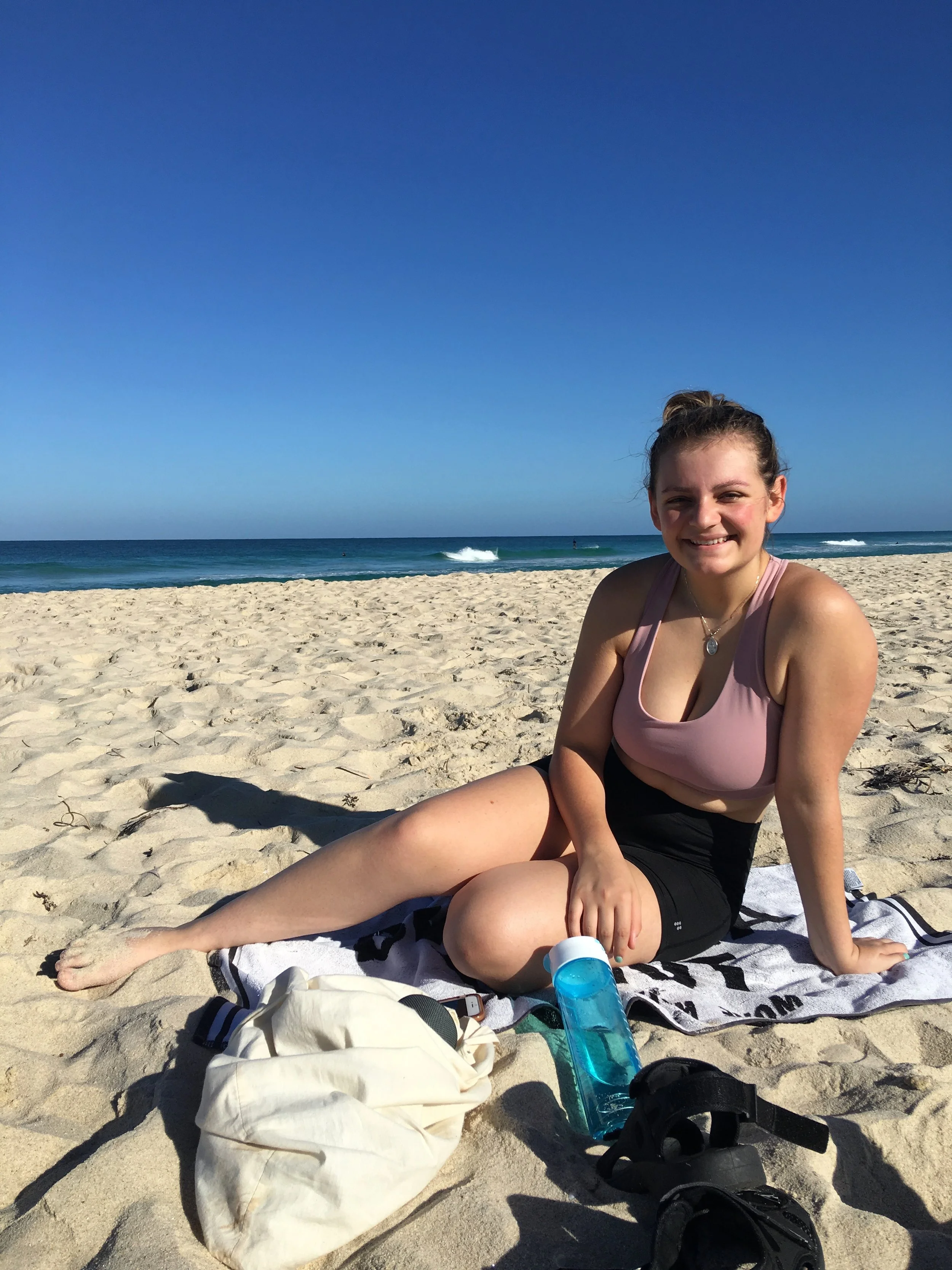 Ciara, taking a break from interval training, Scarborough Beach, Western Australia