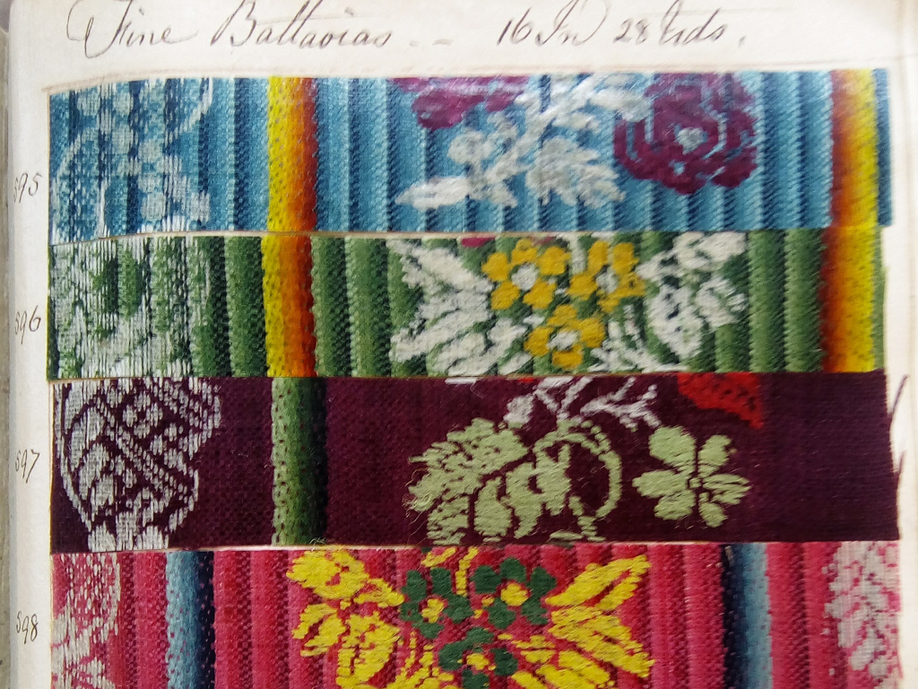 The pattern books hold a huge selection of woven designs, all with their own distinctive names and characteristic elements. image courtesy Norfolk Museum Services