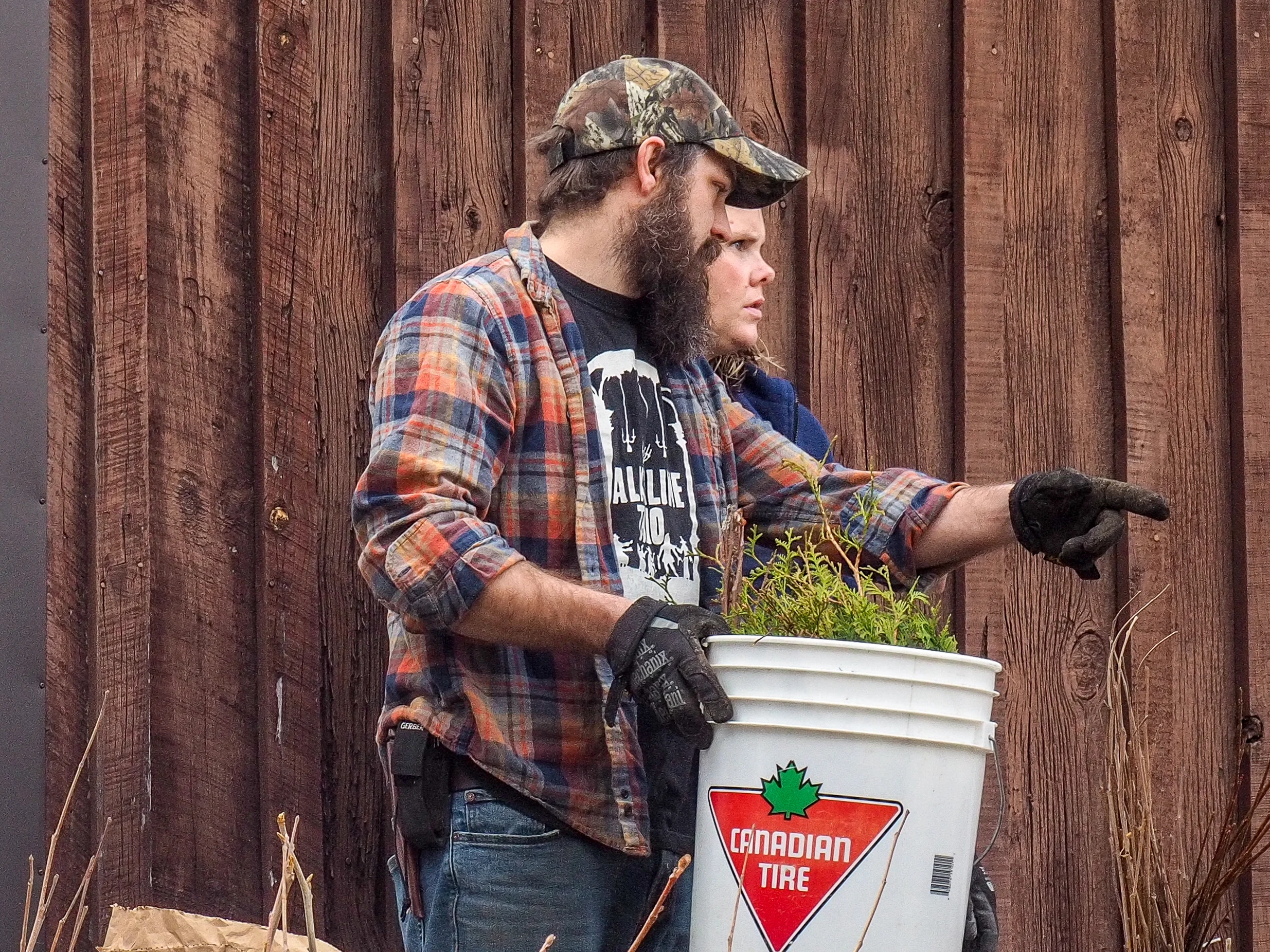 Shaun Meehan (ADTC VP) filling buckets with Betsy Mclure (KCCA Stewardship Supervisor)
