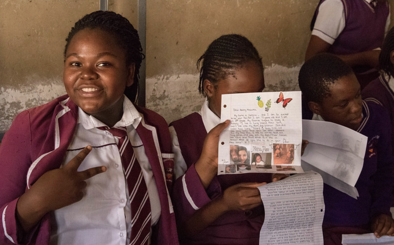 One of the girls loving the letter she received!