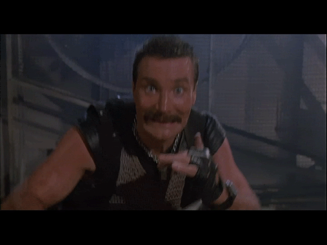 Now look into the camera and be all scary and stuff... (Bennett from Commando 1985)