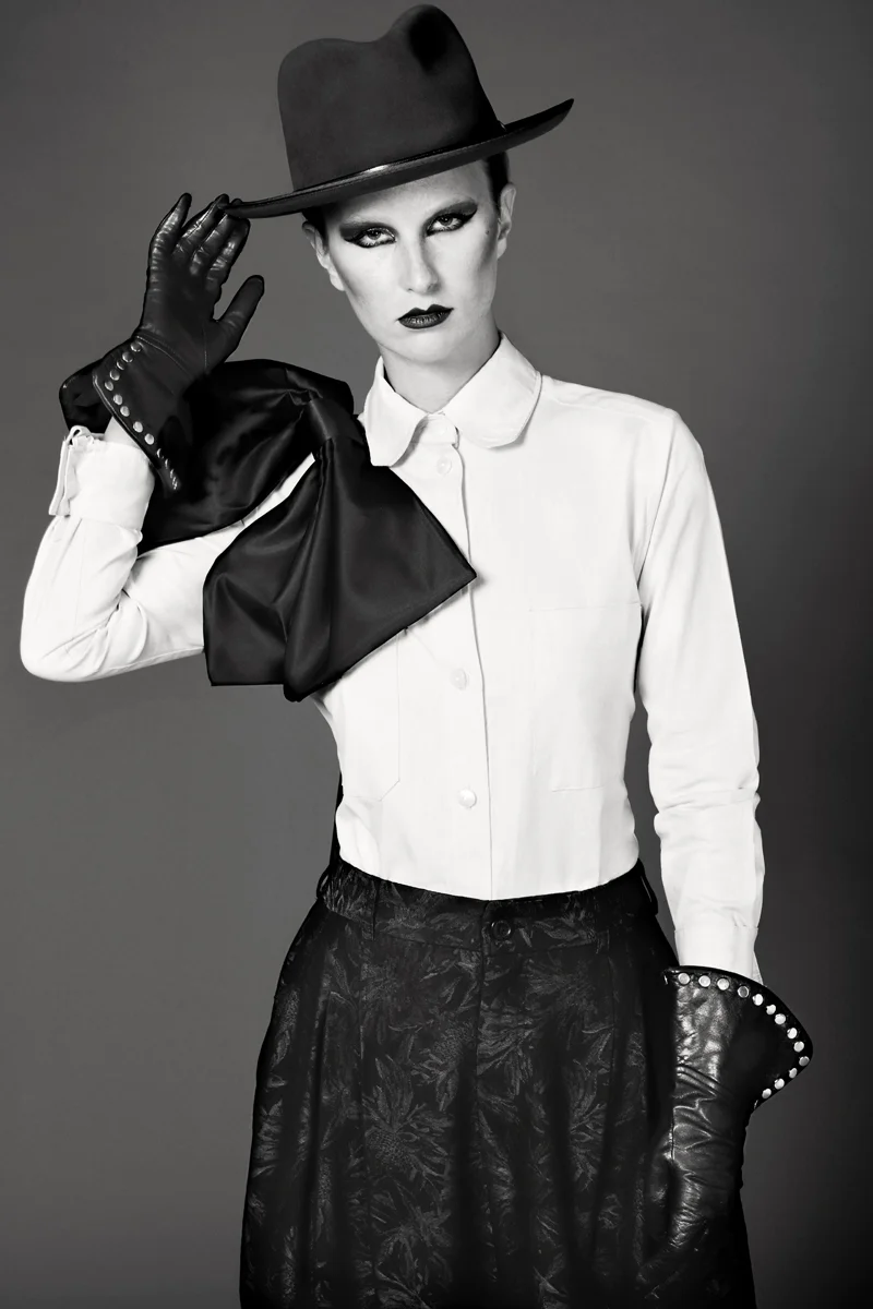 Hat by JJ Hat Center, Shirt With Bow by 9 to 5 socialite, Lace Bottoms by Frank Debourge, Black leather gauntlet gloves w/silver studs by Wing & Weft Gloves