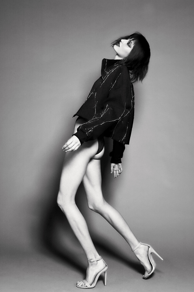 Swimsuit by KORE Swim, Jacket by KQK, Heels by Cult of Coquette
