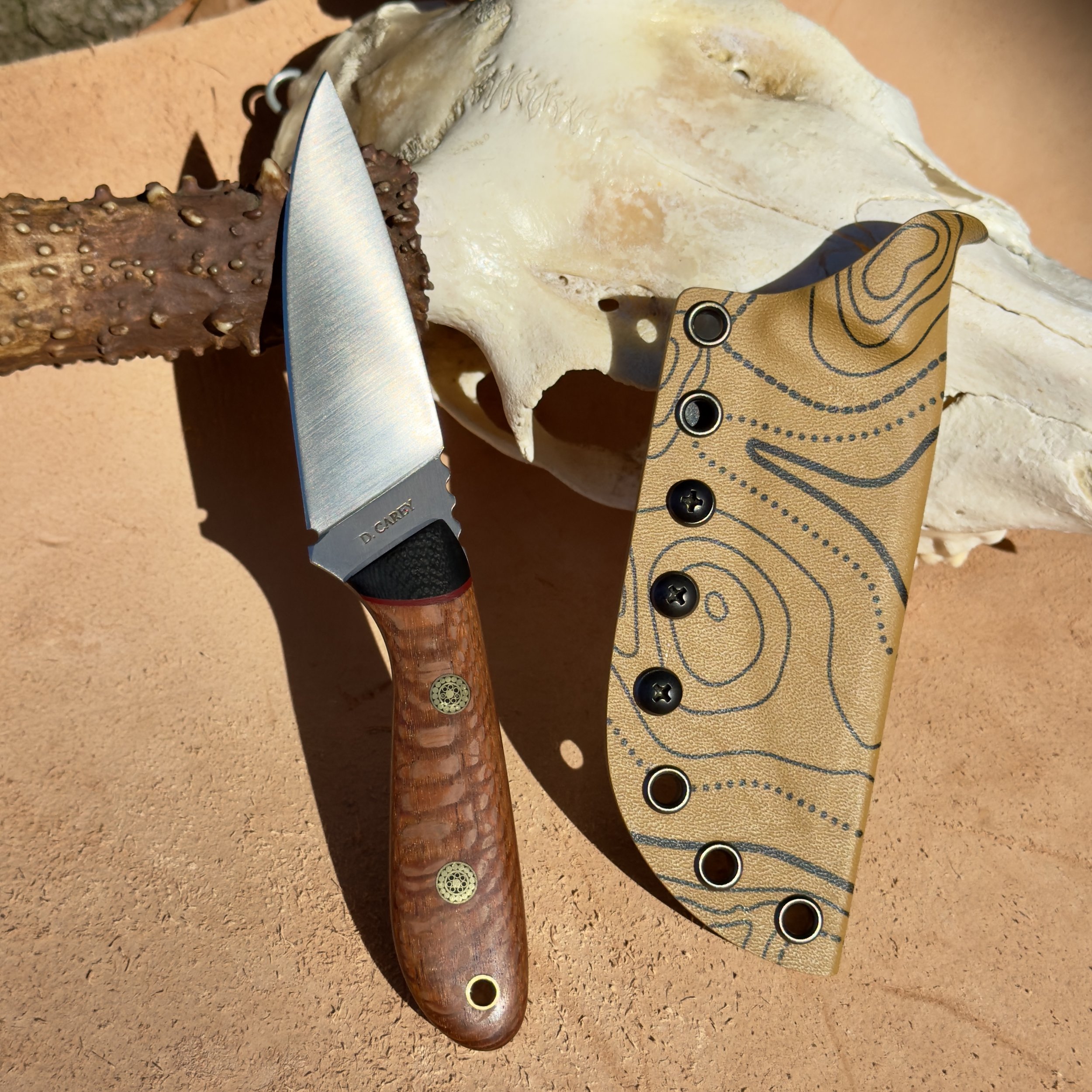 Handmade lacewood hunter knife with CPM-154 blade and topo Kydex sheath