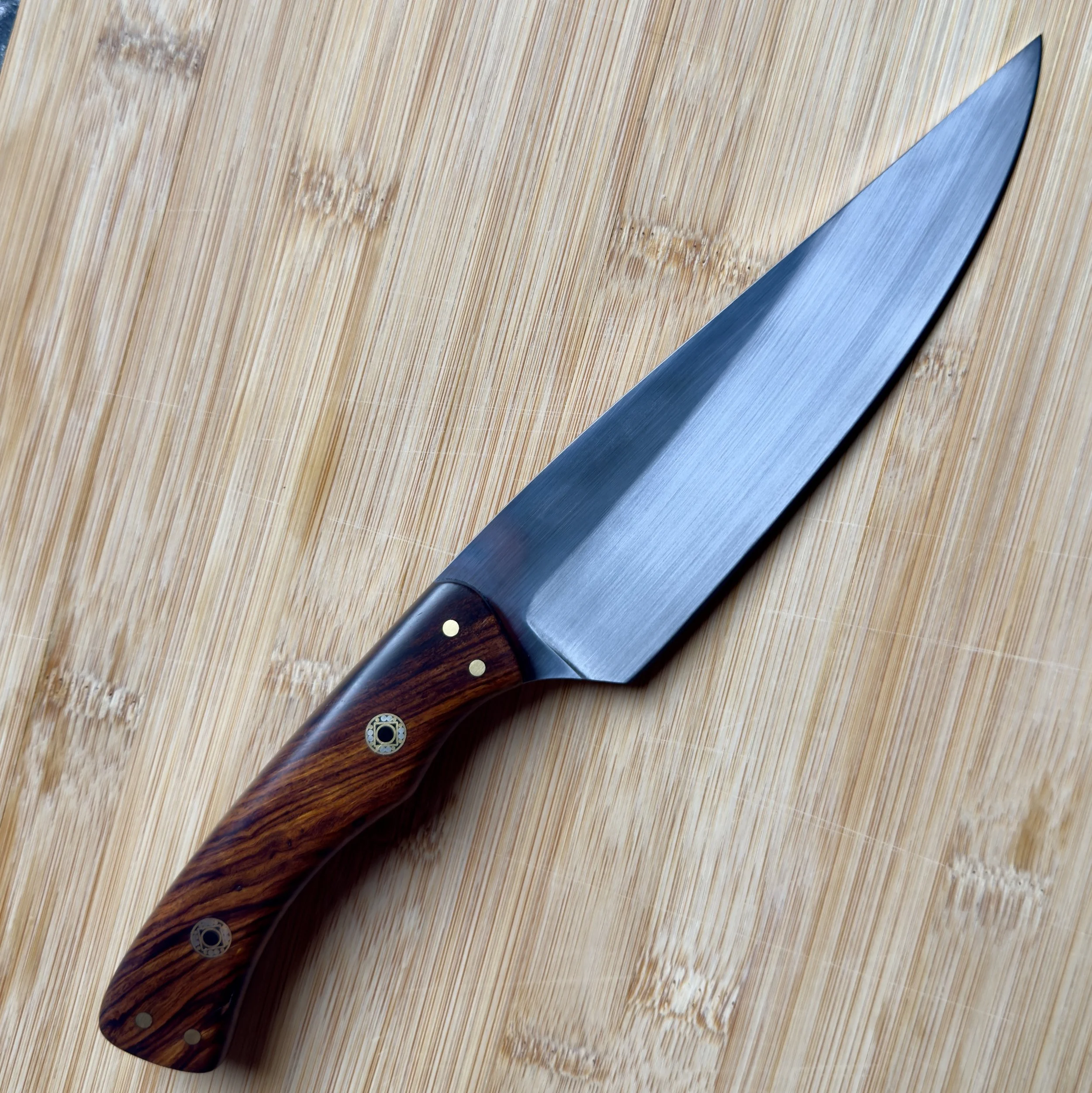 Handmade 6-inch chef knife with a satin-finished 52100 high carbon steel blade and Desert Ironwood handle.