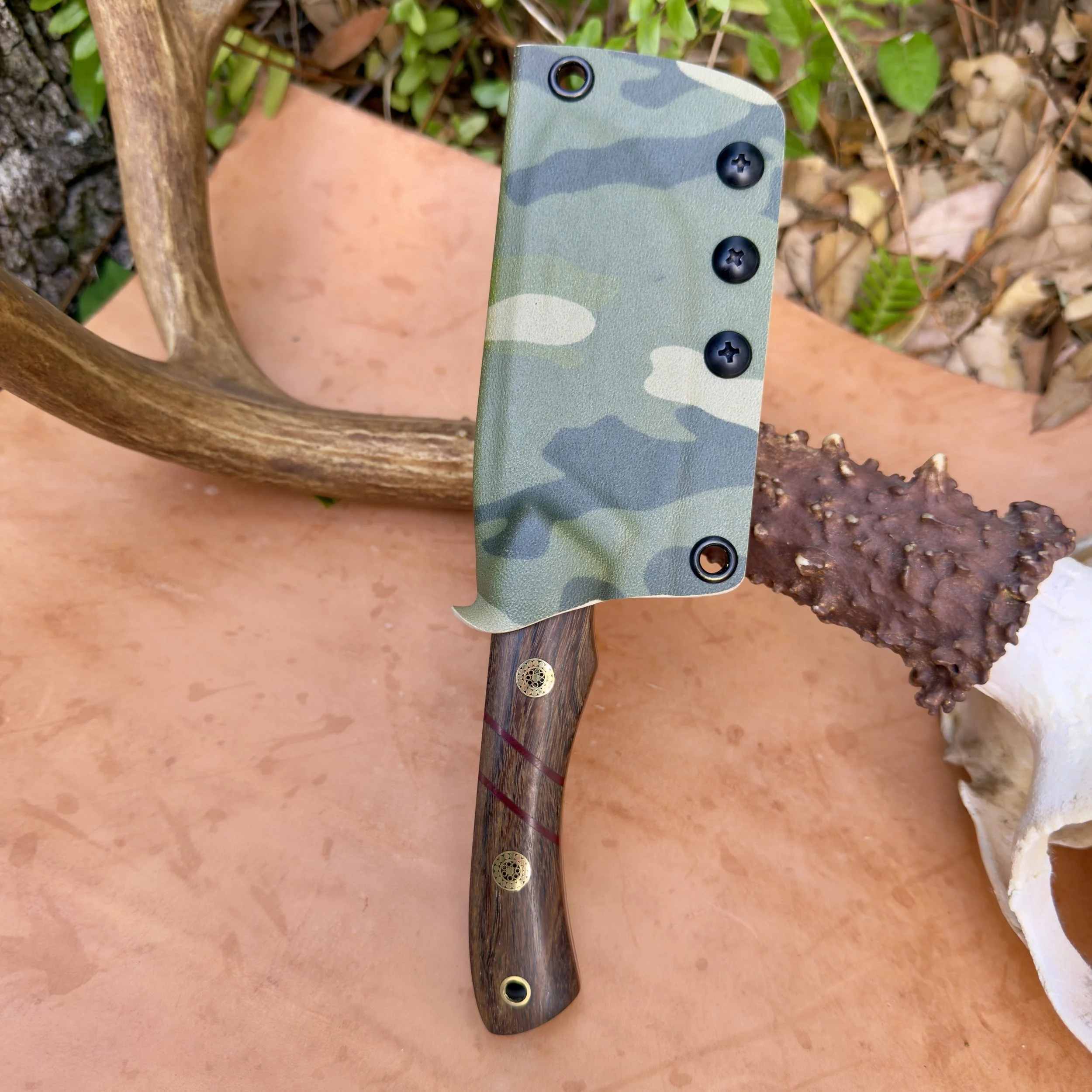 Camo Kydex sheath fitted on handmade skinner knife with belt carry option