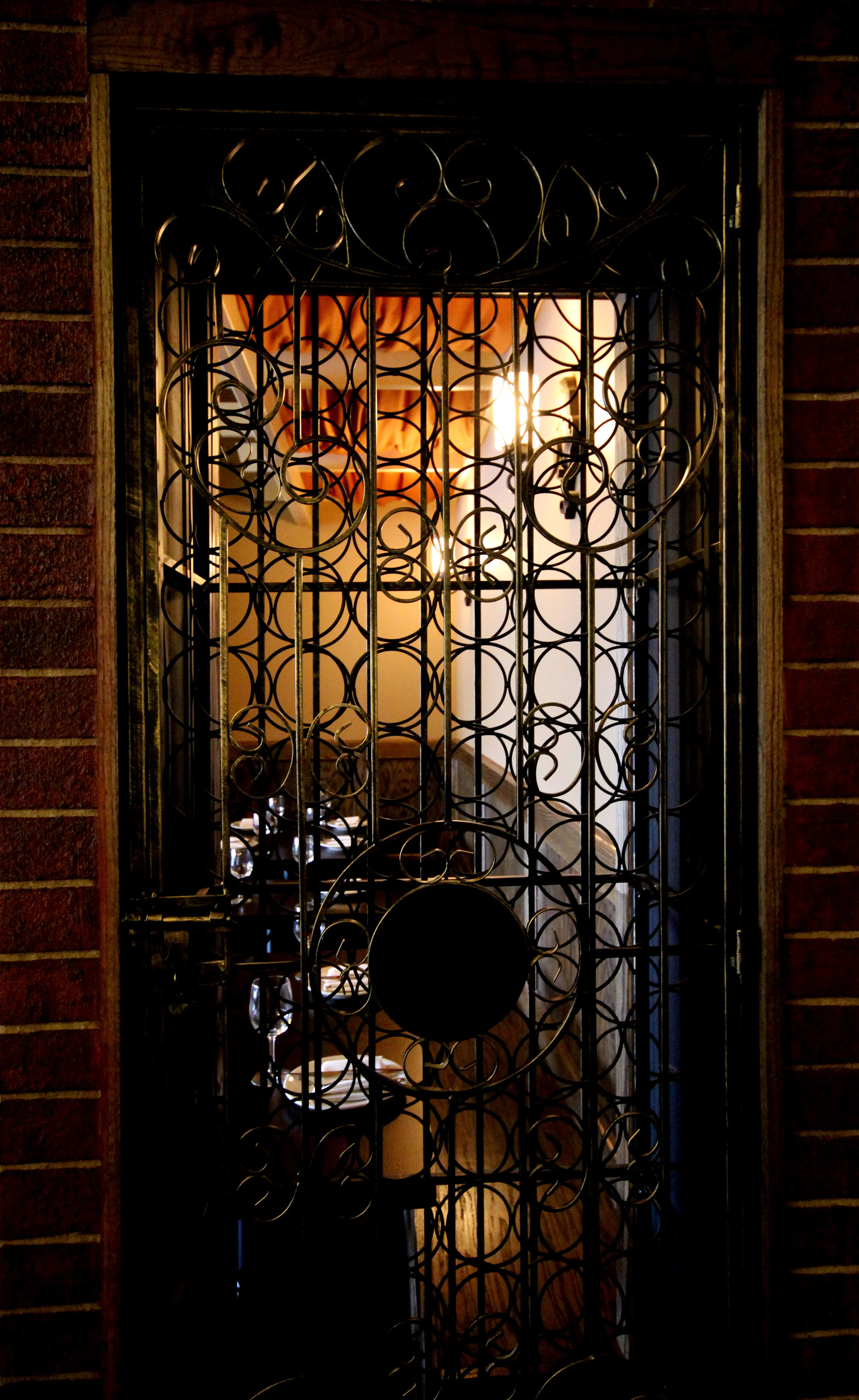 AhPizz thru Wine Rack.jpg