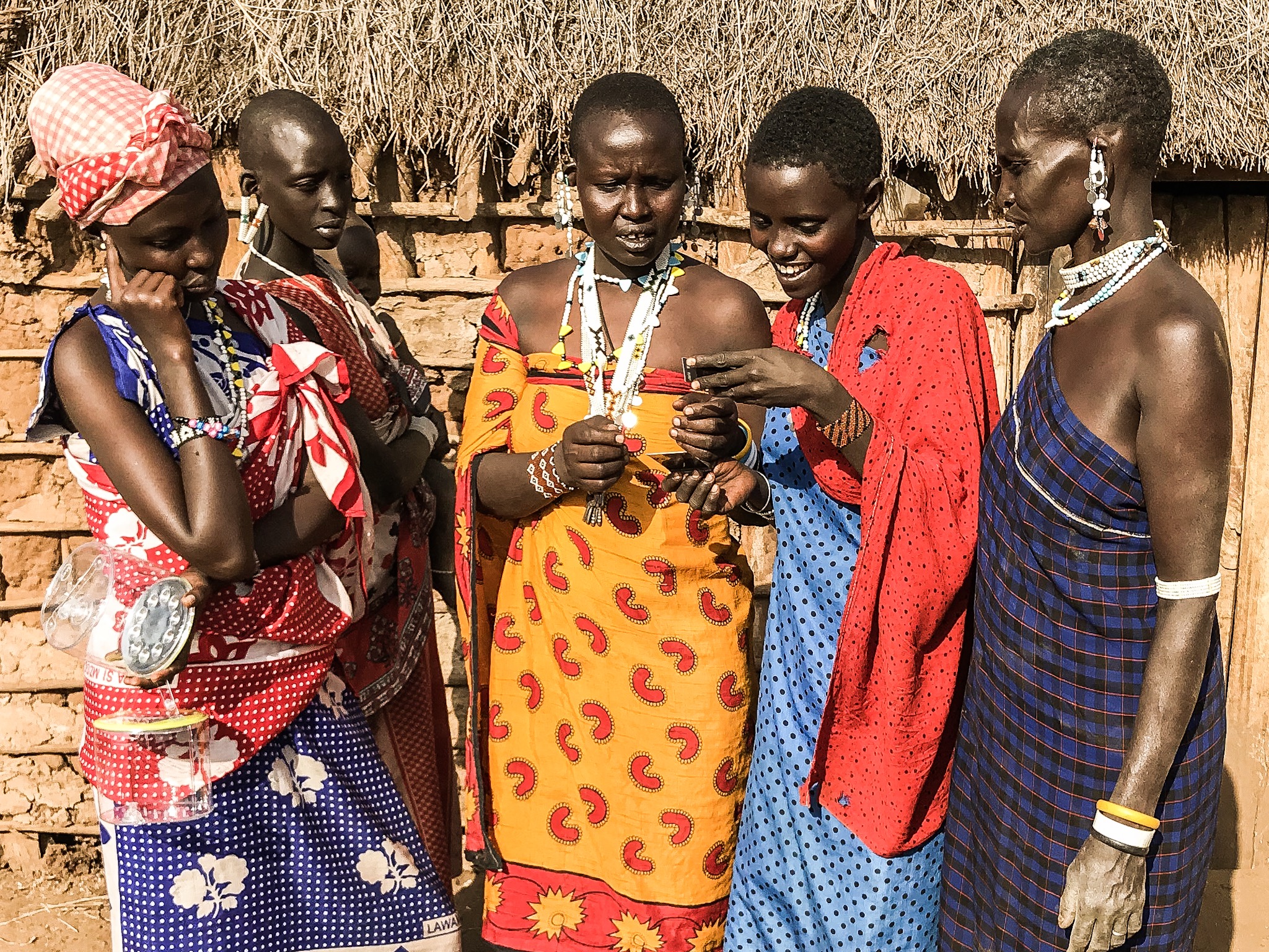 Maasai women with photograph (Copy)