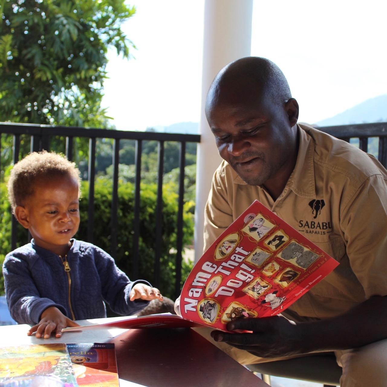 Reading Books in Tanzania Orphanage (Copy)