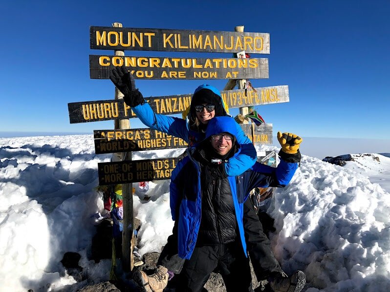 Couple summitting Kilimanjaro