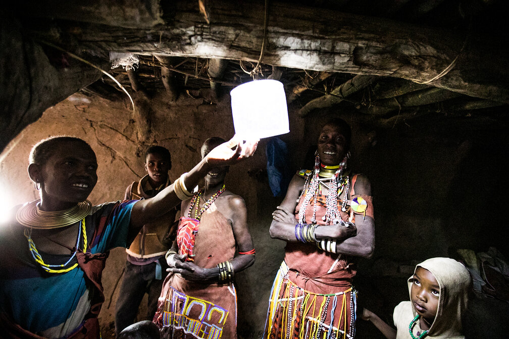 Maasai boma lit up by solar light