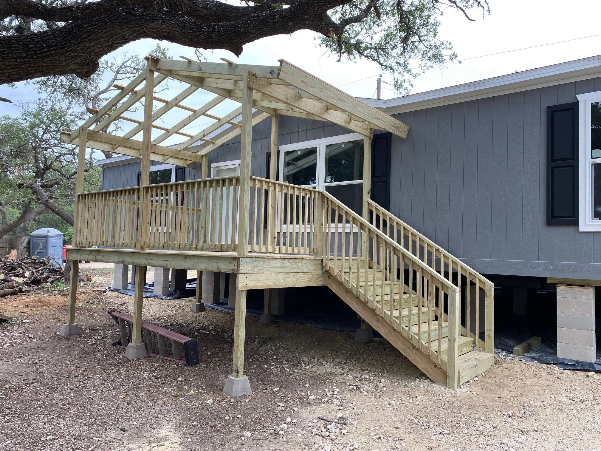  Home in a Month 2023: The Zapatas-Front porch and back door landing installs.