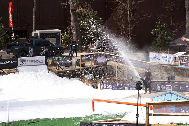 Ice being turned into snow and blown onto the ramp.